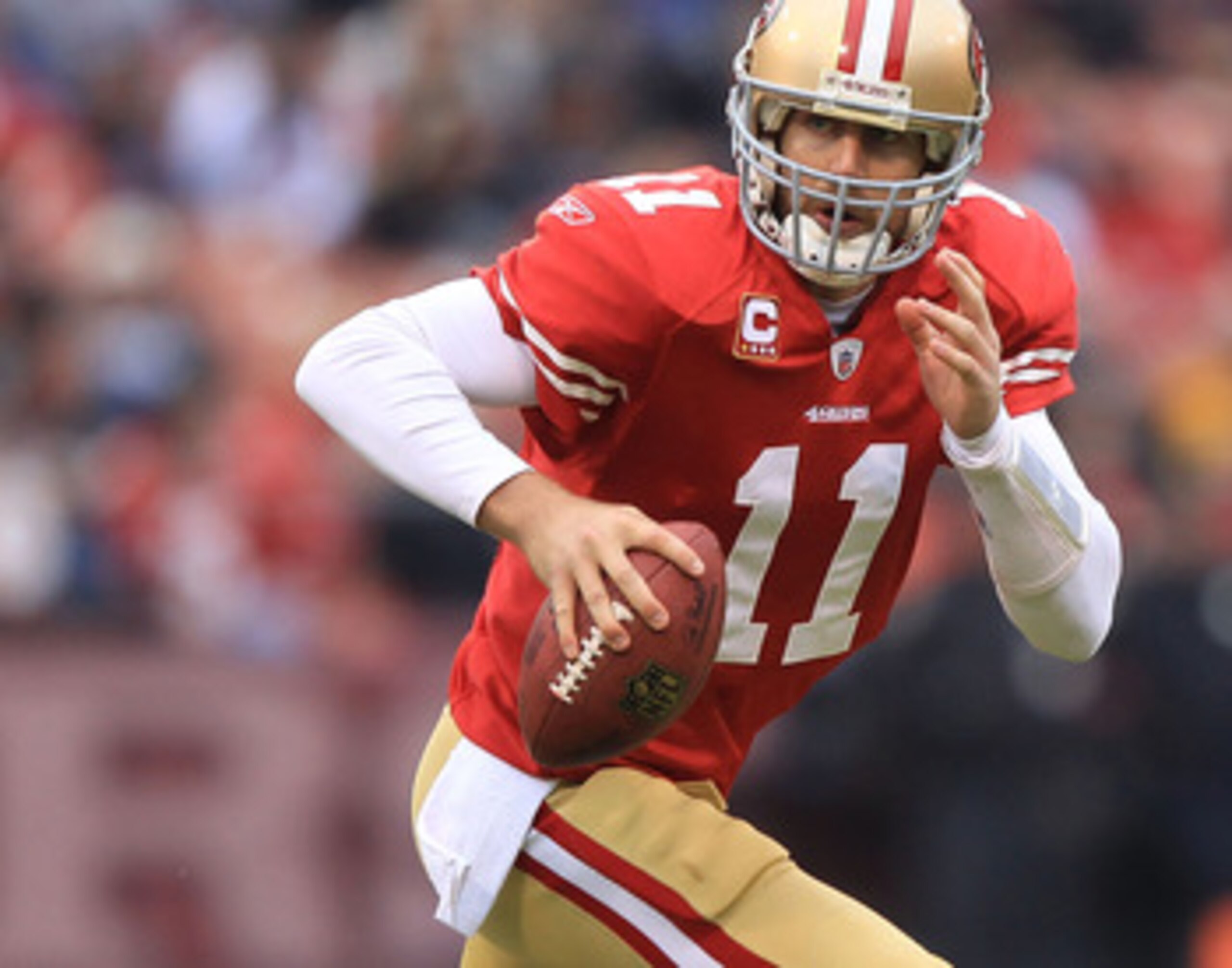 SAN FRANCISCO, CA - JANUARY 02:    Alex Smith #11 of the San Francisco 49ers runs against the Arizona Cardinals during an NFL game at Candlestick Park on January 2, 2011 in San Francisco, California.  (Photo by Jed Jacobsohn/Getty Images)