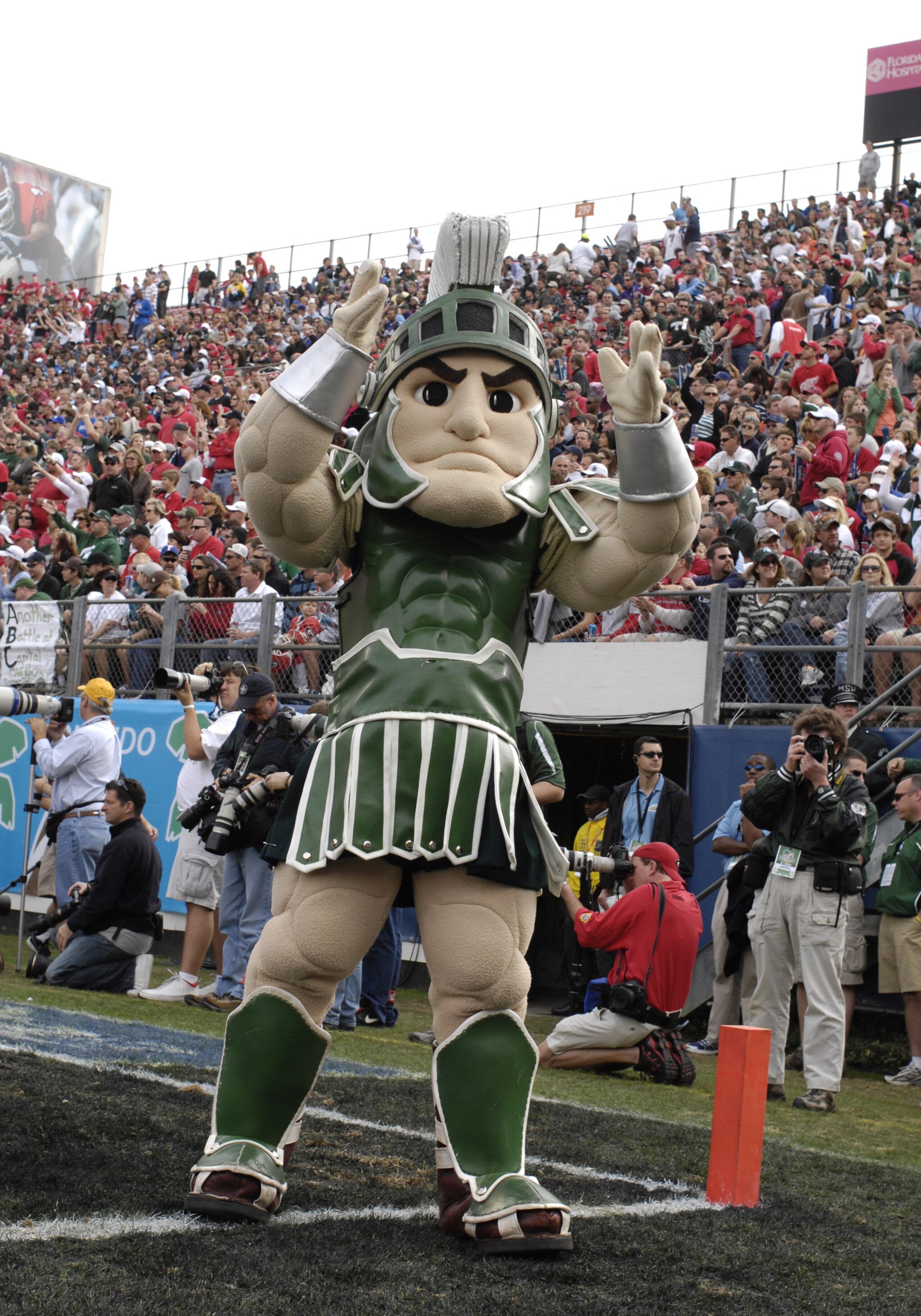 ORLANDO, FL - JANUARY 1: Sparty, the mascot of the Michigan State Spartans cheers play against the Georgia Bulldogs at the 2009 Capital One Bowl at the Citrus Bowl on January 1, 2009 in Orlando, Florida.  (Photo by Al Messerschmidt/Getty Images)