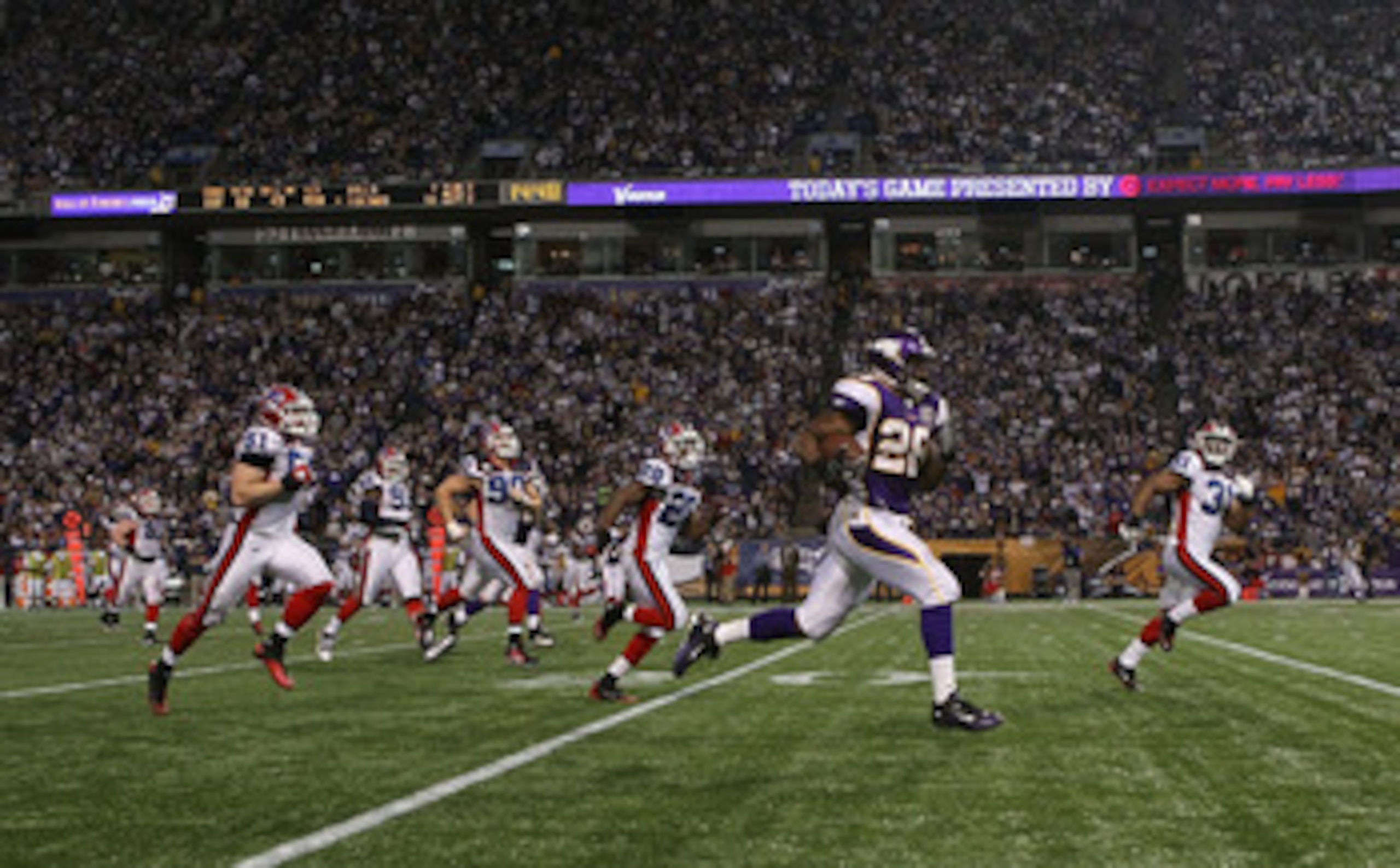 MINNEAPOLIS, MN - DECEMBER 05:  Adrian Peterson #28 of the Minnesota Vikings rushes for a touchdown against the Buffalo Bills at the Mall of America Field at the Hubert H. Humphrey Metrodome on December 5, 2010 in Minneapolis, Minnesota.  (Photo by Nick L