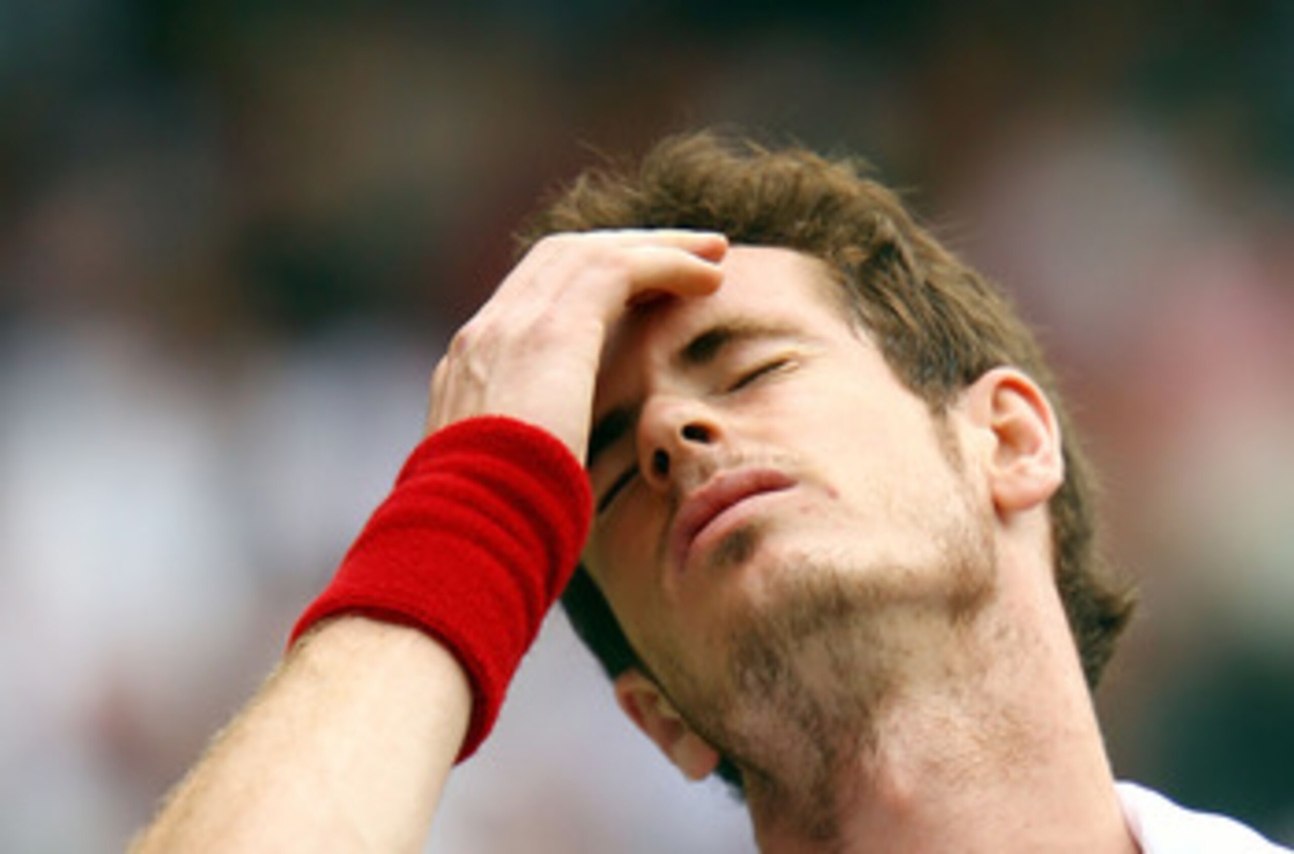 LONDON, ENGLAND - JULY 02: Andy Murray of Great Britain reacts during the Men's Semi Final match against Rafael Nadal of Spain on Day Eleven of the Wimbledon Lawn Tennis Championships at the All England Lawn Tennis and Croquet Club on July 2, 2010 in Lon LONDON, ENGLAND - JULY 02: Andy Murray of Great Britain reacts during the Men's Semi Final match against Rafael Nadal of Spain on Day Eleven of the Wimbledon Lawn Tennis Championships at the All England Lawn Tennis and Croquet Club on July 2, 2010 in Lon