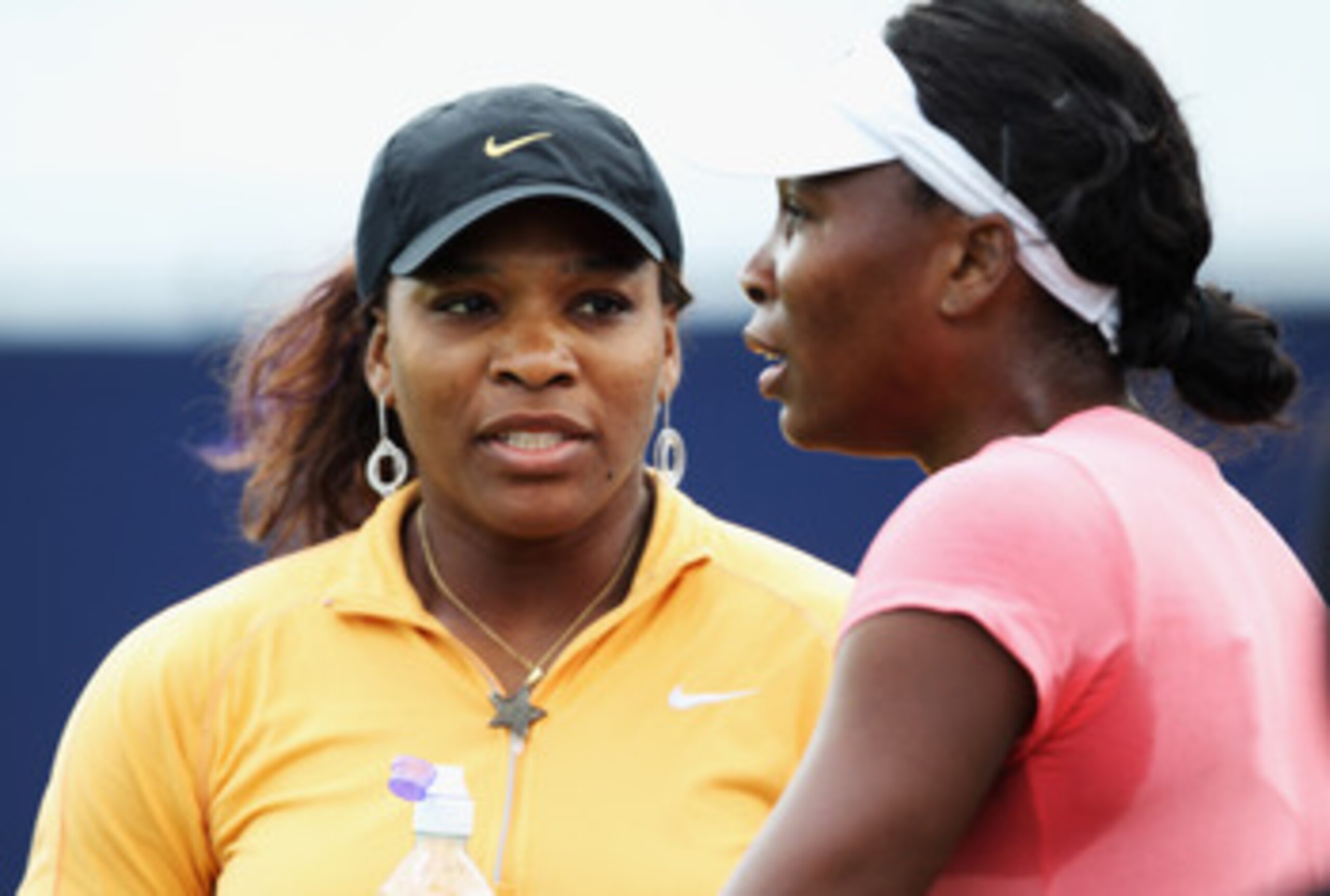 EASTBOURNE, ENGLAND - JUNE 11: Serena Williams (L) of the USA chats to her sister Venus during a break in practice for the AEGON International on June 11, 2011 in Eastbourne, England. (Photo by Bryn Lennon/Getty Images) EASTBOURNE, ENGLAND - JUNE 11: Serena Williams (L) of the USA chats to her sister Venus during a break in practice for the AEGON International on June 11, 2011 in Eastbourne, England. (Photo by Bryn Lennon/Getty Images)