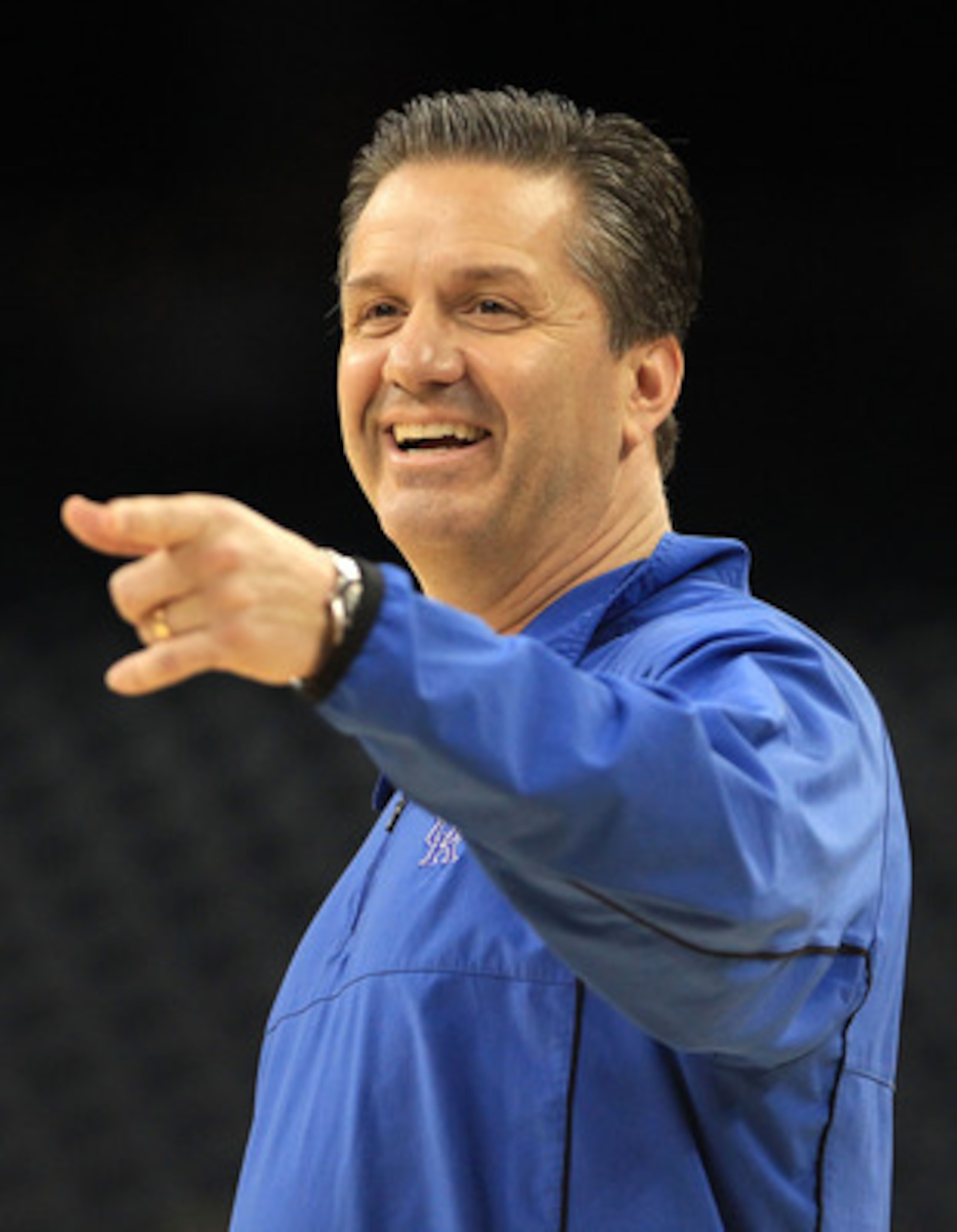 HOUSTON, TX - APRIL 01:  Head coach John Calipari of the Kentucky Wildcats points during practice prior to the 2011 Final Four of the NCAA Division I Men's Basketball Tournament at Reliant Stadium on April 1, 2011 in Houston, Texas.  (Photo by Streeter Le