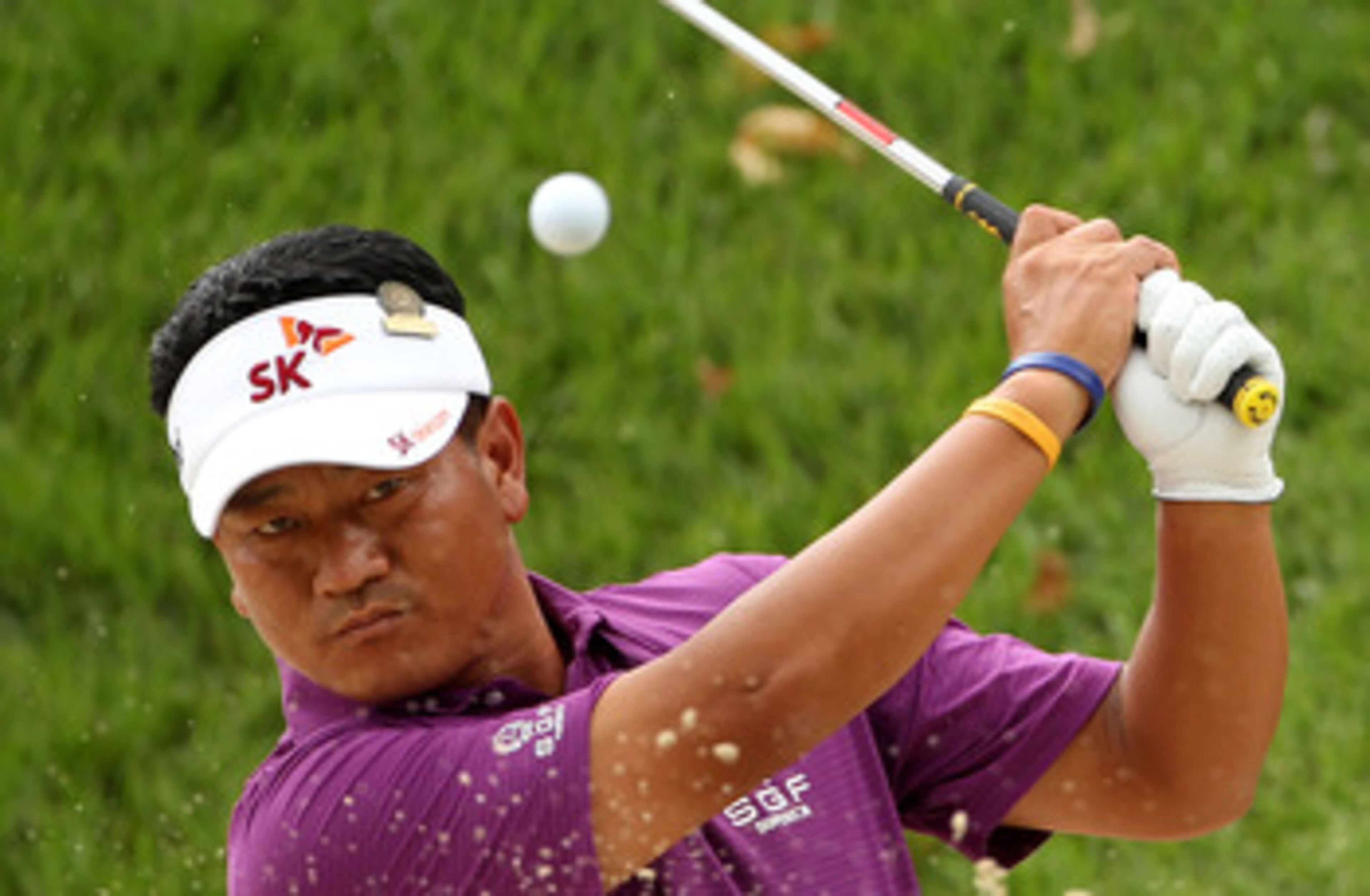 BETHESDA, MD - JUNE 14:   K.J. Choi of South Korea hits a shot during a practice round prior to the start of the 111th U.S. Open at Congressional Country Club on June 14, 2011 in Bethesda, Maryland.  (Photo by Ross Kinnaird/Getty Images)