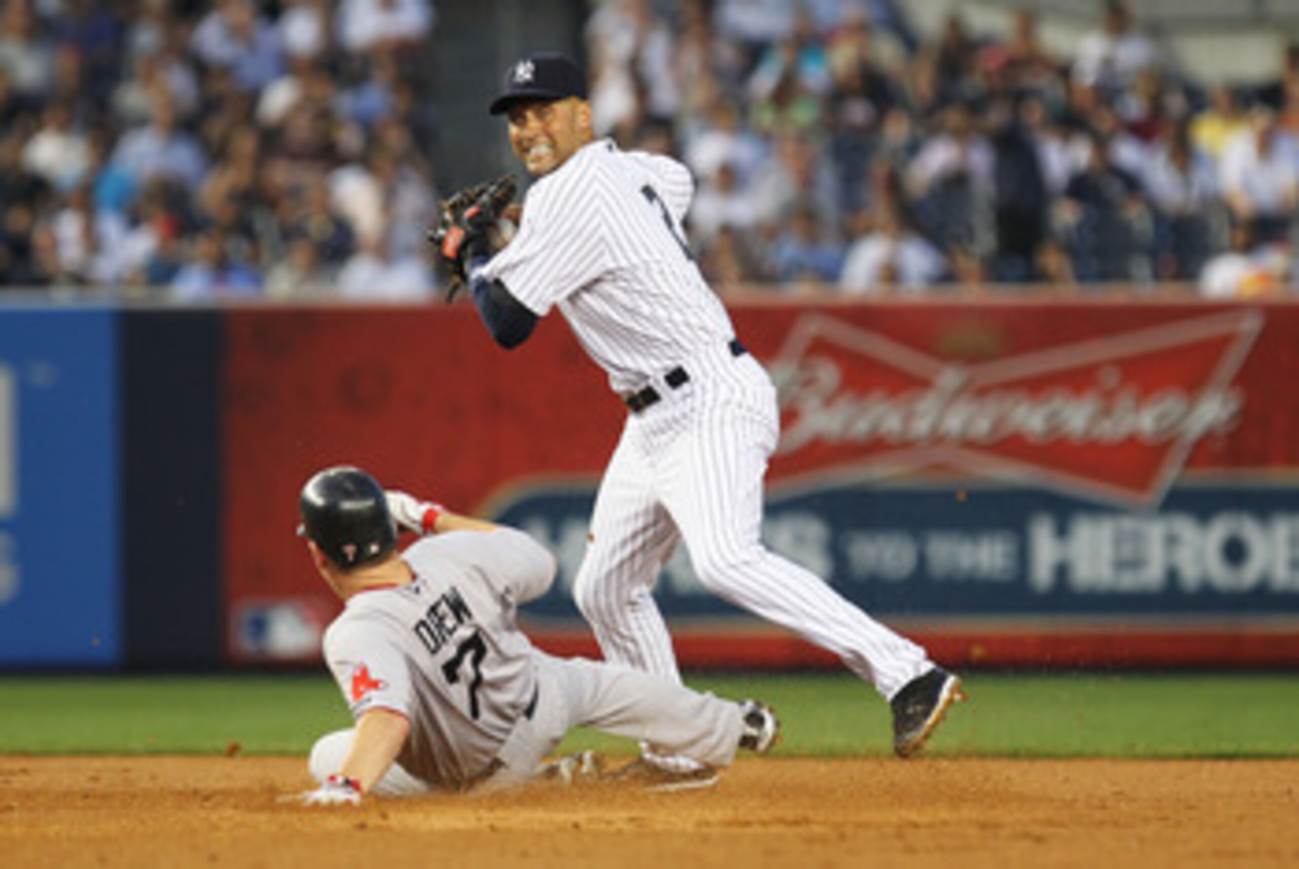 NEW YORK, NY - JUNE 08:  Derek Jeter #2 of the New York Yankees gets the force out against J.D. Drew #7 of the Boston Red Sox during their game on June 8, 2011 at Yankee Stadium in the Bronx borough of New York City.  (Photo by Al Bello/Getty Images)