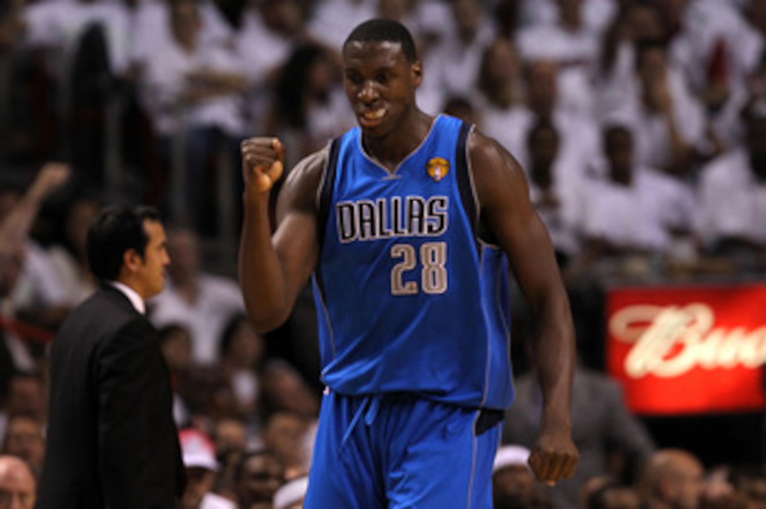 MIAMI, FL - JUNE 12:  Ian Mahinmi #28 of the Dallas Mavericks celebrates after he made a basket at the buzzer of the end of the third quarter against the Miami Heat in Game Six of the 2011 NBA Finals at American Airlines Arena on June 12, 2011 in Miami, F