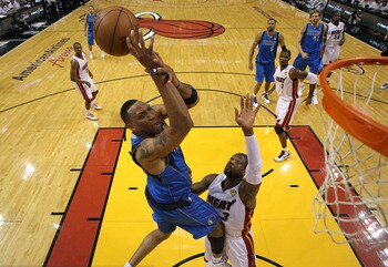 MIAMI, FL - JUNE 12:  Shawn Marion #0 of the Dallas Mavericks attempts a shot against Dwyane Wade #3 of the Miami Heat in the first quarter of Game Six of the 2011 NBA Finals at American Airlines Arena on June 12, 2011 in Miami, Florida. NOTE TO USER: Use