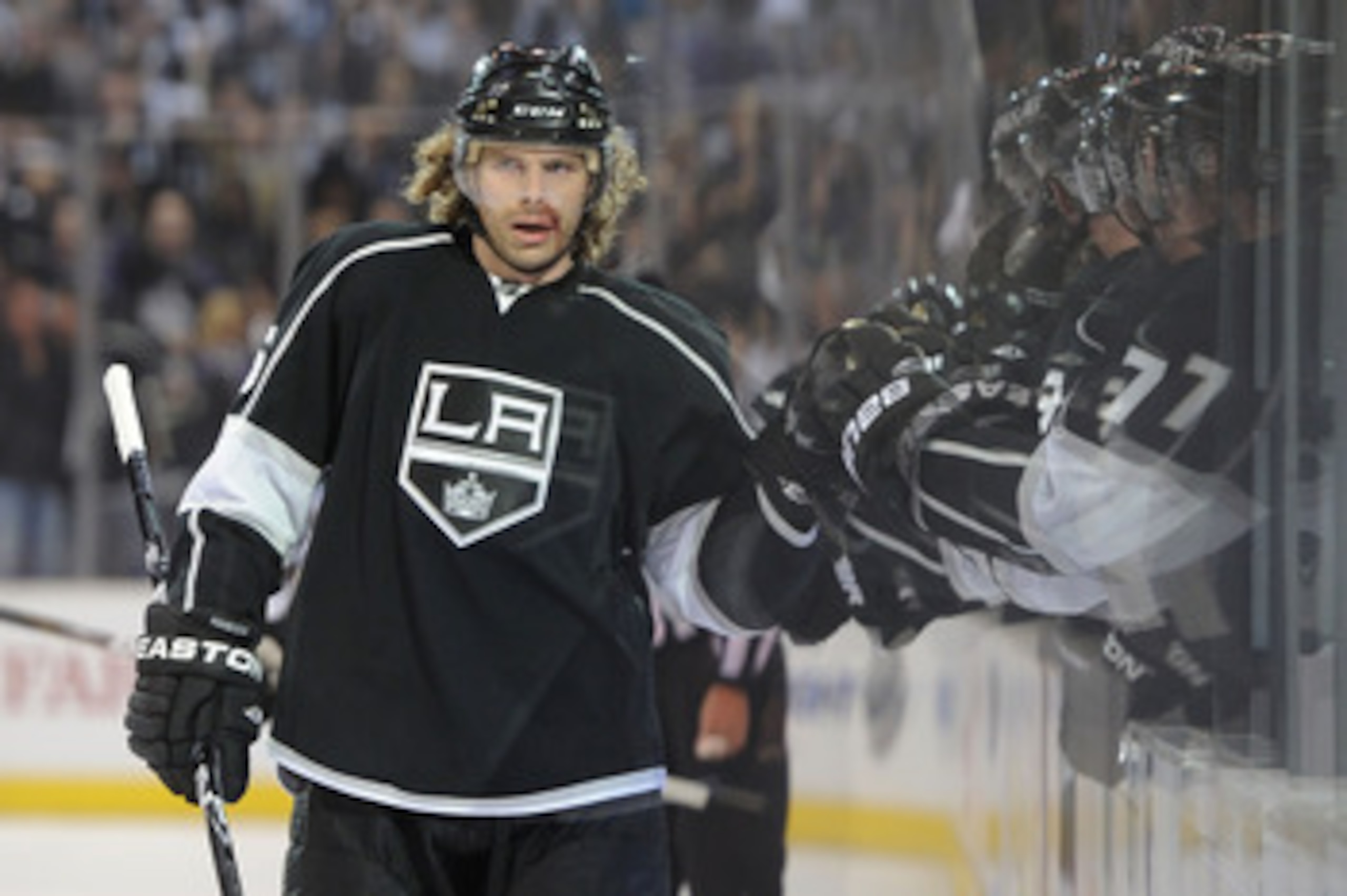 LOS ANGELES, CA - APRIL 19:  Michal Handzus #26 of the Los Angeles Kings celebrates with teammates after scoring a goal in the first period against the San Jose Sharks in game three of the Western Conference Quarterfinals during the 2011 NHL Stanley Cup P