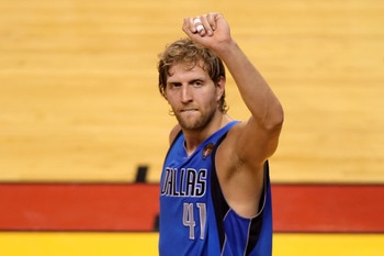 MIAMI, FL - JUNE 12:  Dirk Nowitzki #41 of the Dallas Mavericks celebrates against the Miami Heat in Game Six of the 2011 NBA Finals at American Airlines Arena on June 12, 2011 in Miami, Florida. The Mavericks won 105-95. NOTE TO USER: User expressly ackn