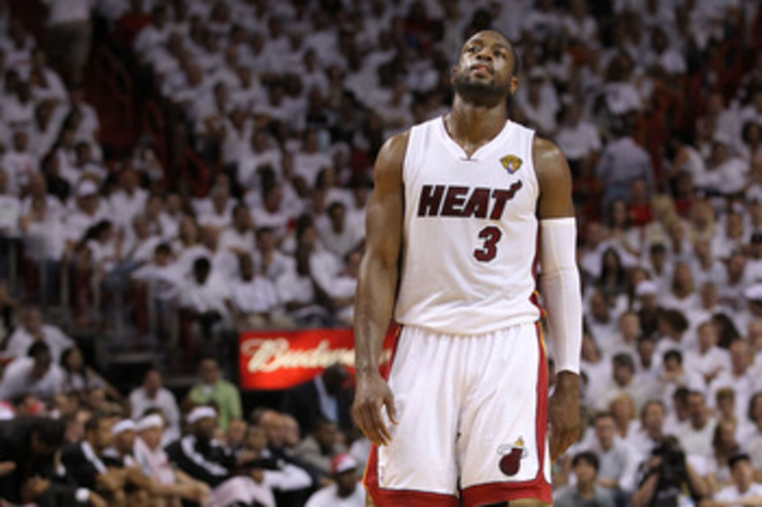 MIAMI, FL - JUNE 12:  Dwyane Wade #3 of the Miami Heat reacts while taking on the Dallas Mavericks in Game Six of the 2011 NBA Finals at American Airlines Arena on June 12, 2011 in Miami, Florida. NOTE TO USER: User expressly acknowledges and agrees that,