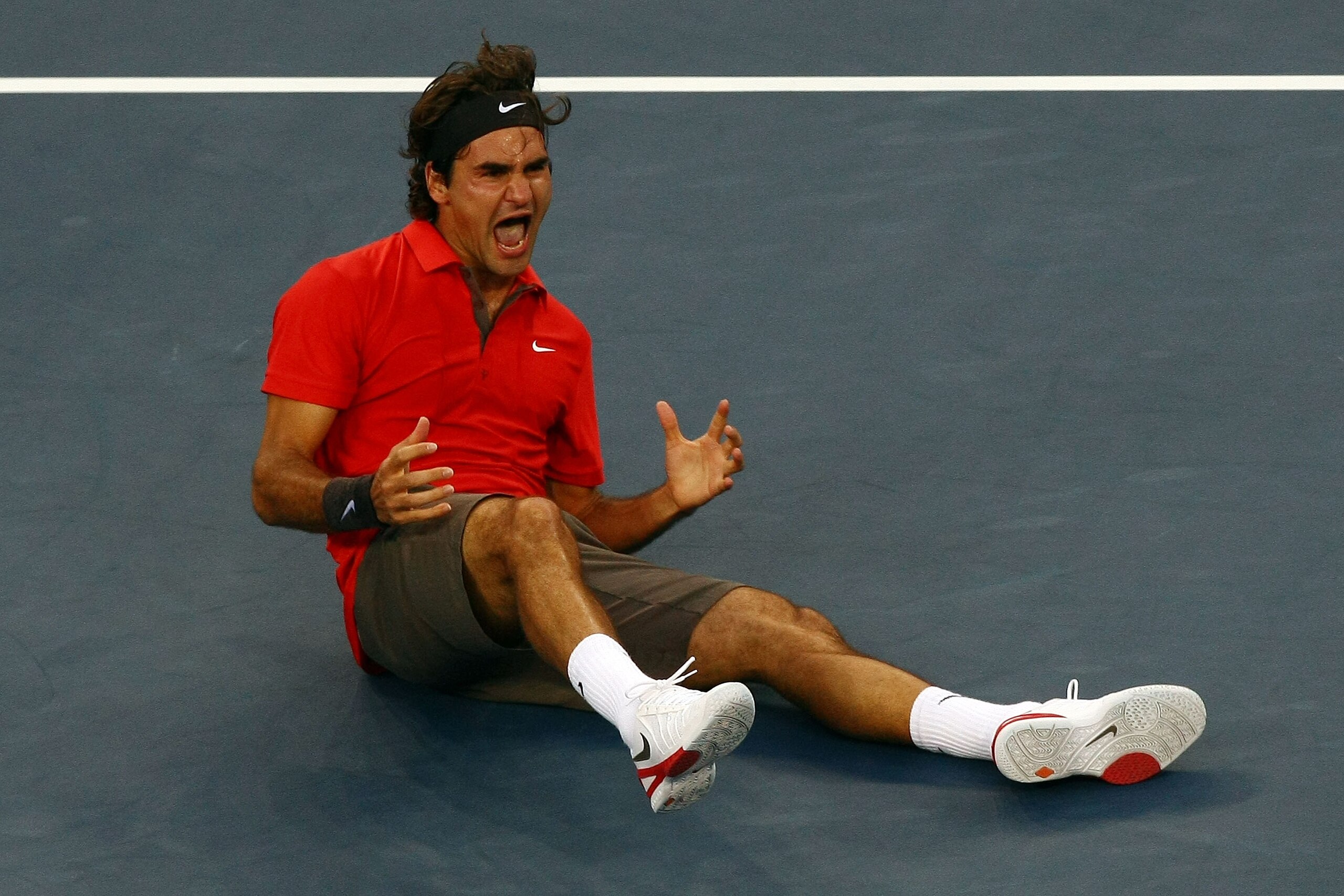 NEW YORK - SEPTEMBER 08:  Roger Federer of Switzerland reacts after defeating Andy Murray of the United Kingdom to win the 2008 U.S. Open Men's Championship Match in Arthur Ashe Stadium at the USTA Billie Jean King National Tennis Center on September 8, 2