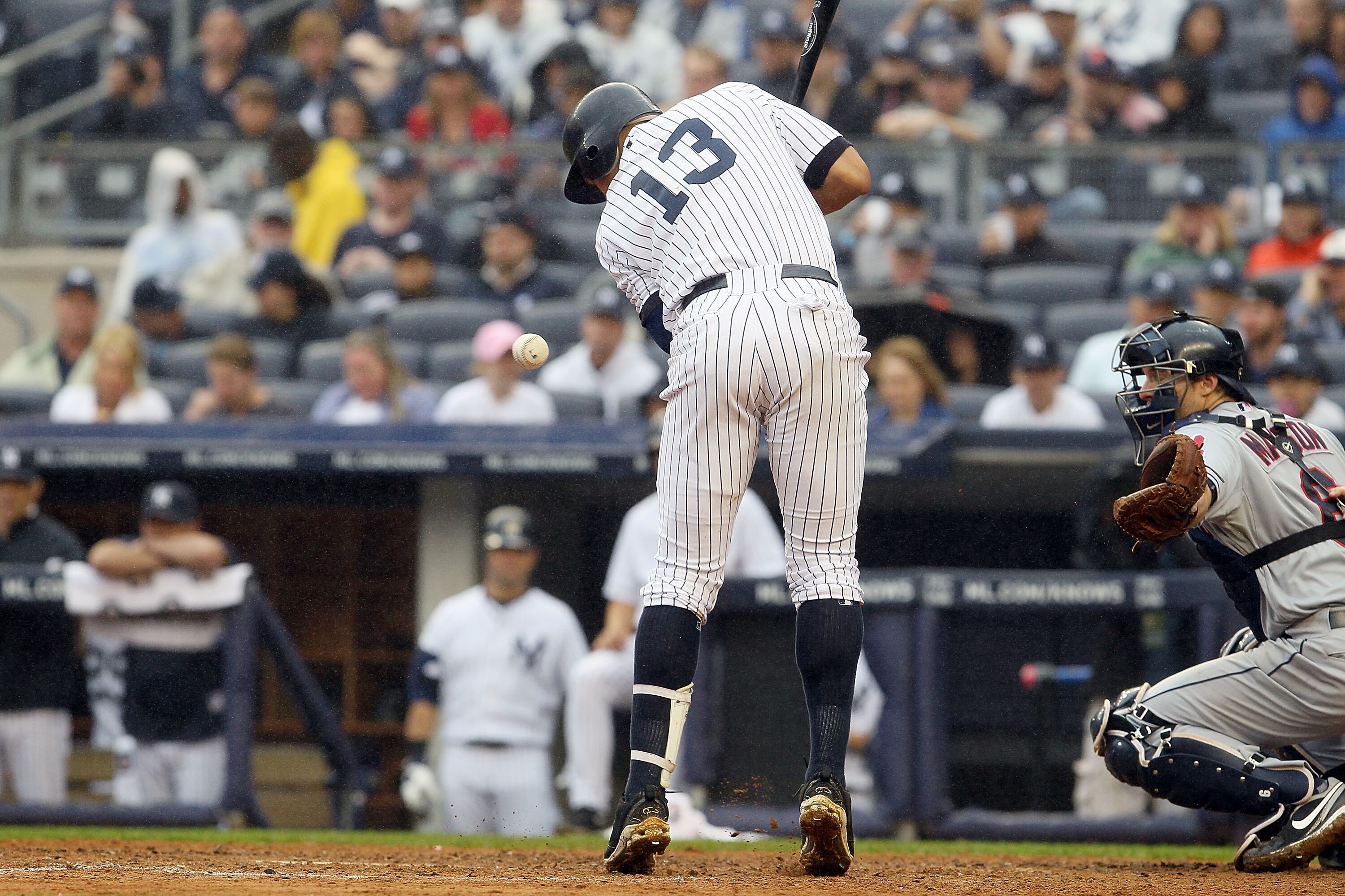 NEW YORK, NY - JUNE 11:  Alex Rodriguez #13 of the New York Yankees is hit with a sixth inning pitch against the Cleveland Indians on June 11, 2011 at Yankee Stadium in the Bronx borough of New York City.  (Photo by Jim McIsaac/Getty Images)