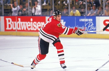 INGLEWOOD, CA - 1989:  Defense Keith Brown #4 of the Chicago Blackhawks takes a shot against the Los Angeles Kings during a game at the Great Western Forum during the 1989-90 season in Inglewood, California.  (Photo by Mike Powell/Getty Images)