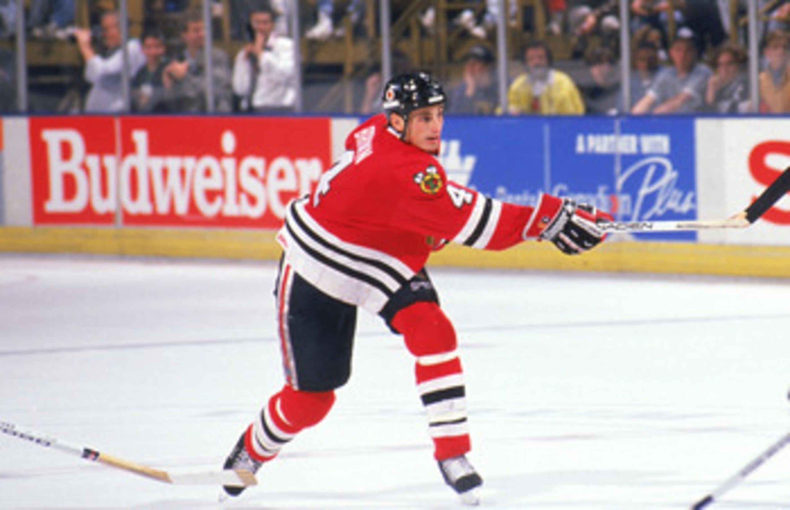 INGLEWOOD, CA - 1989:  Defense Keith Brown #4 of the Chicago Blackhawks takes a shot against the Los Angeles Kings during a game at the Great Western Forum during the 1989-90 season in Inglewood, California.  (Photo by Mike Powell/Getty Images)