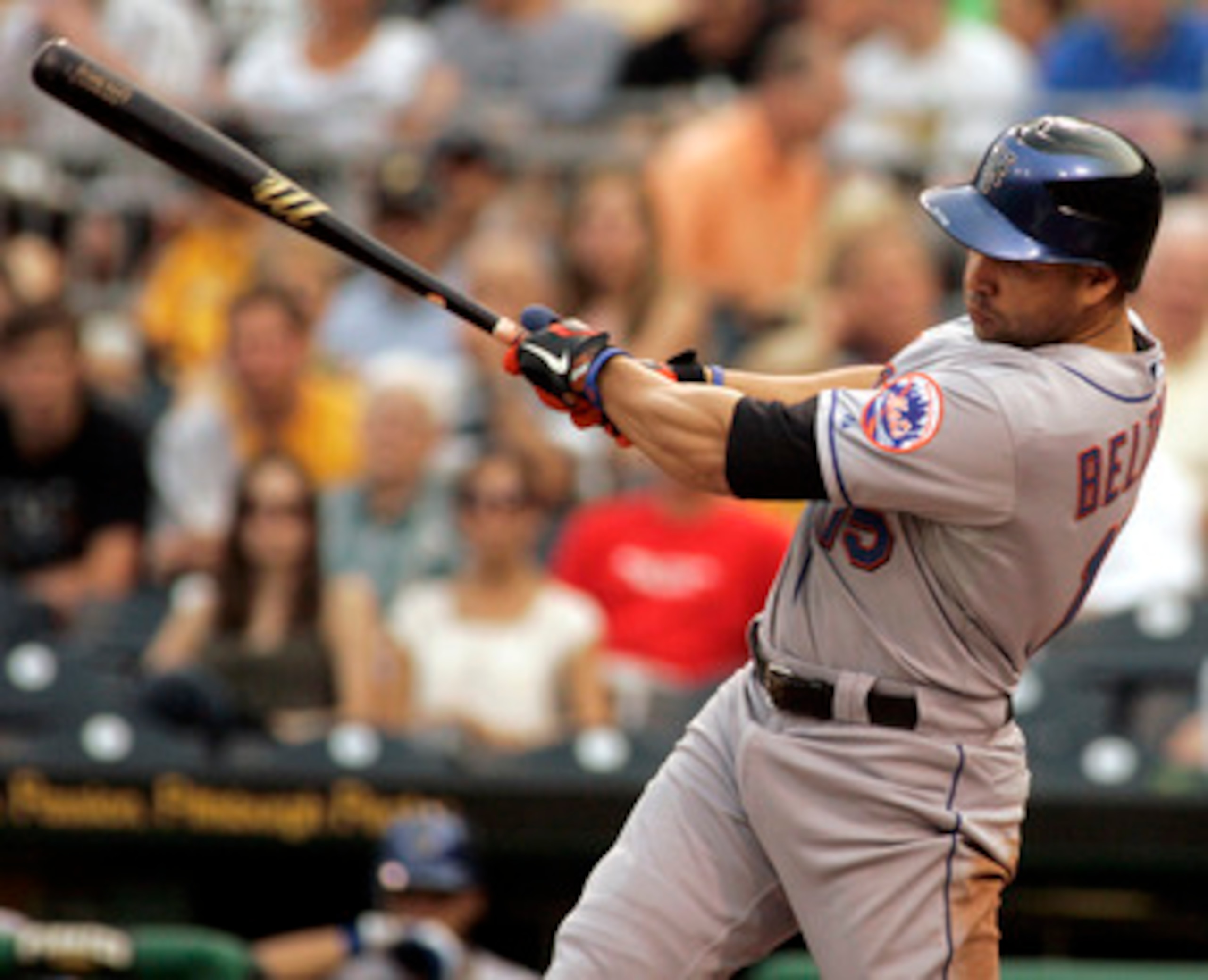PITTSBURGH, PA - JUNE 10:  Carlos Beltran #15 of the New York Mets gets a hit against the Pittsburgh Pirates during the game on June 10, 2011 at PNC Park in Pittsburgh, Pennsylvania.  (Photo by Justin K. Aller/Getty Images)
