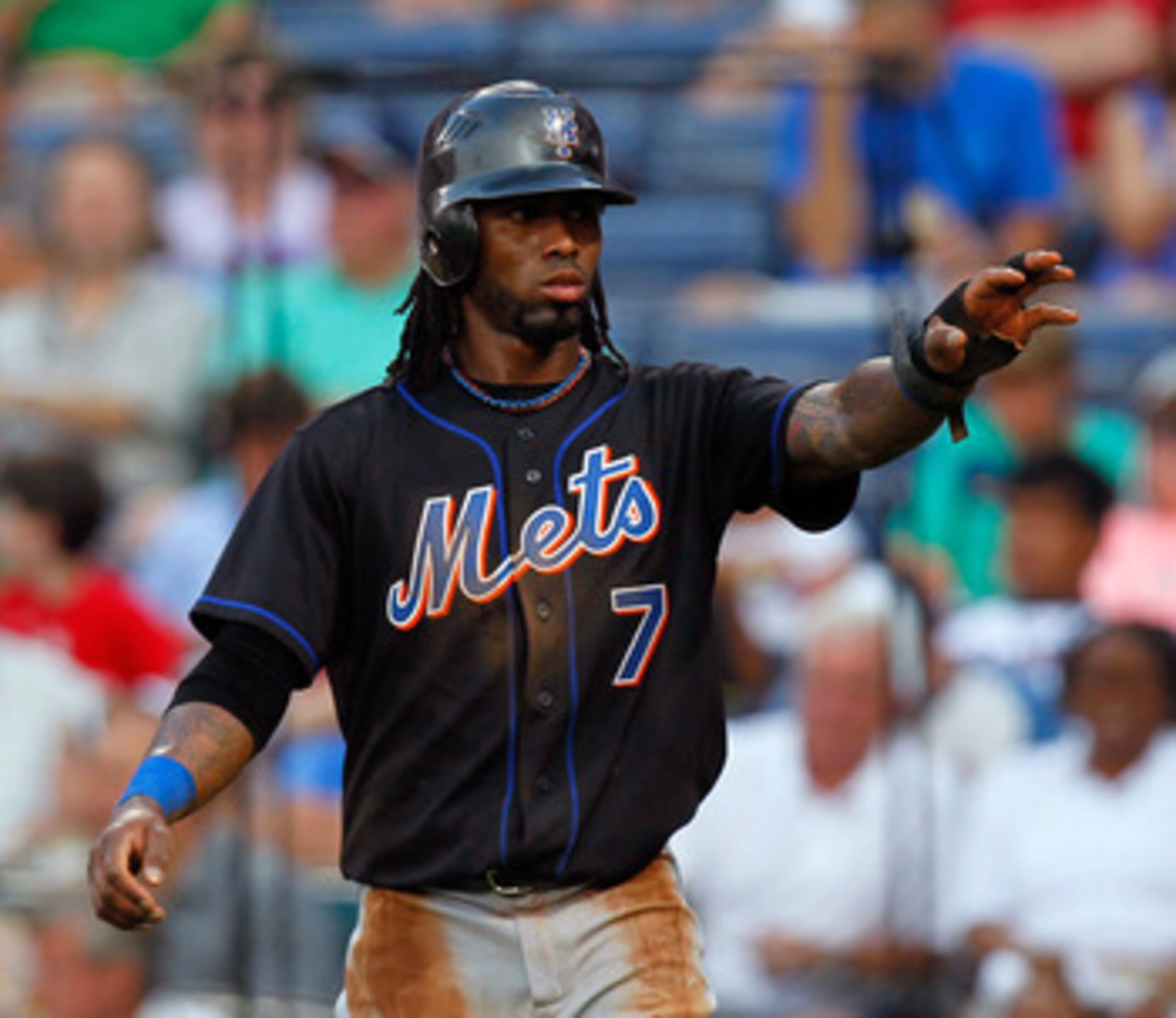 ATLANTA, GA - JUNE 14:  Jose Reyes #7 of the New York Mets reacts after scoring in the third inning against the Atlanta Braves at Turner Field on June 14, 2011 in Atlanta, Georgia.  (Photo by Kevin C. Cox/Getty Images)