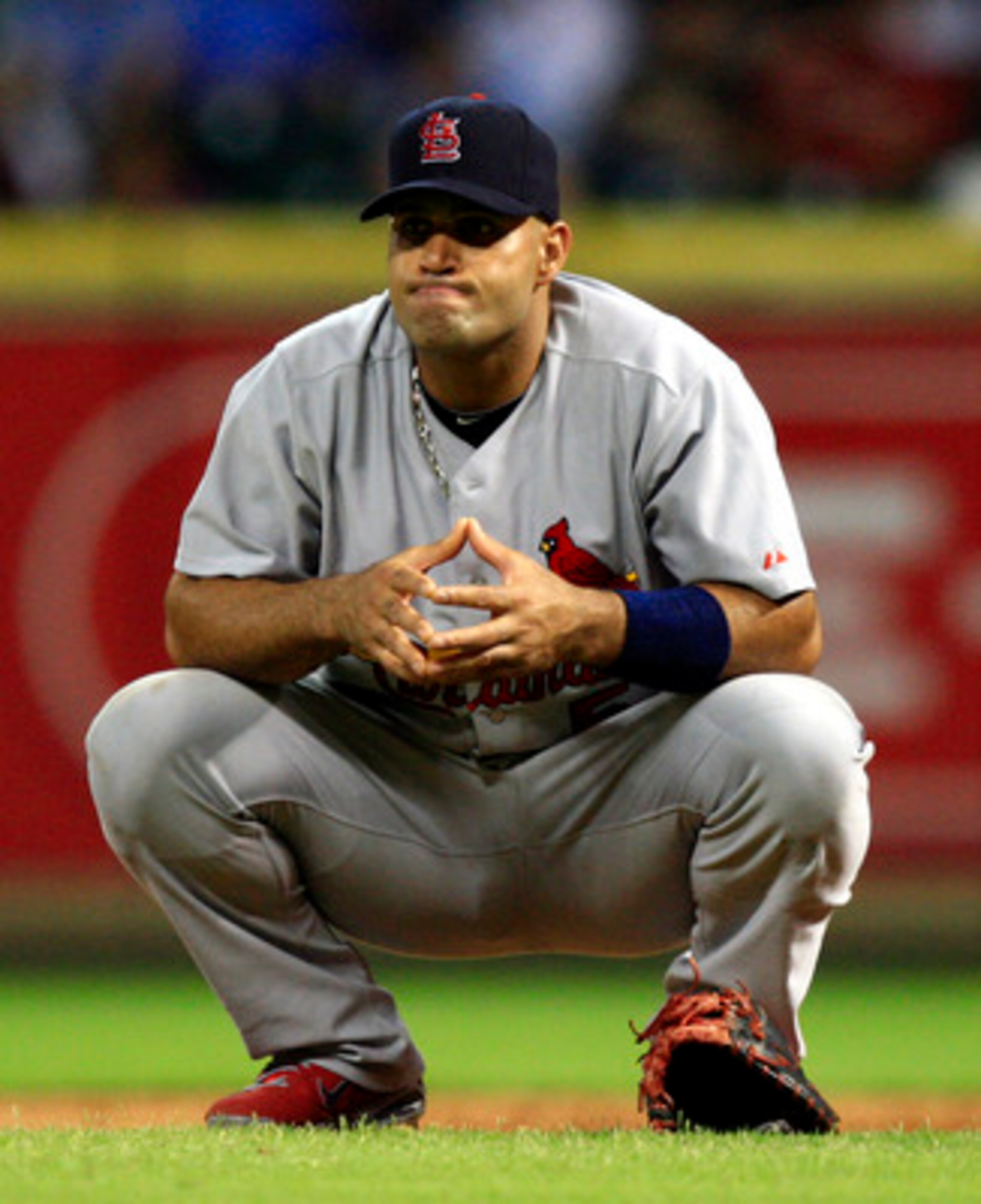 HOUSTON - JUNE 07:  First baseman Albert Pujols #5 of the St. Louis Cardinals takes a break during a pitching change against the Houston Astros at Minute Maid Park on June 7, 2011 in Houston, Texas.  (Photo by Bob Levey/Getty Images)