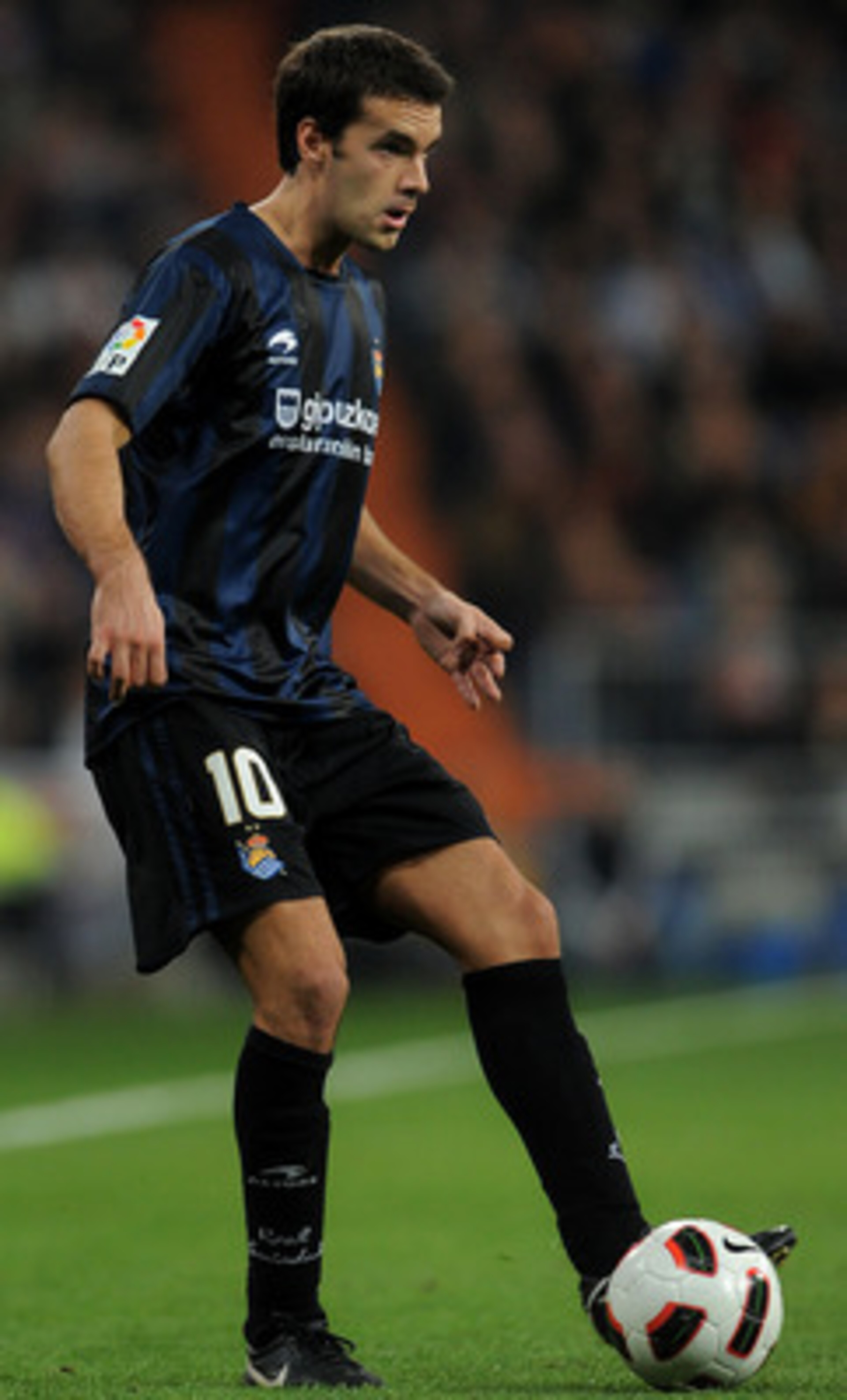 MADRID, SPAIN - FEBRUARY 06: Xabier Prieto of Real Sociedad strikes the ball during the la Liga match between Real Madrid and Real Sociedad at Estadio Santiago Bernabeu on February 6, 2011 in Madrid, Spain. (Photo by Jasper Juinen/Getty Images) MADRID, SPAIN - FEBRUARY 06: Xabier Prieto of Real Sociedad strikes the ball during the la Liga match between Real Madrid and Real Sociedad at Estadio Santiago Bernabeu on February 6, 2011 in Madrid, Spain. (Photo by Jasper Juinen/Getty Images)