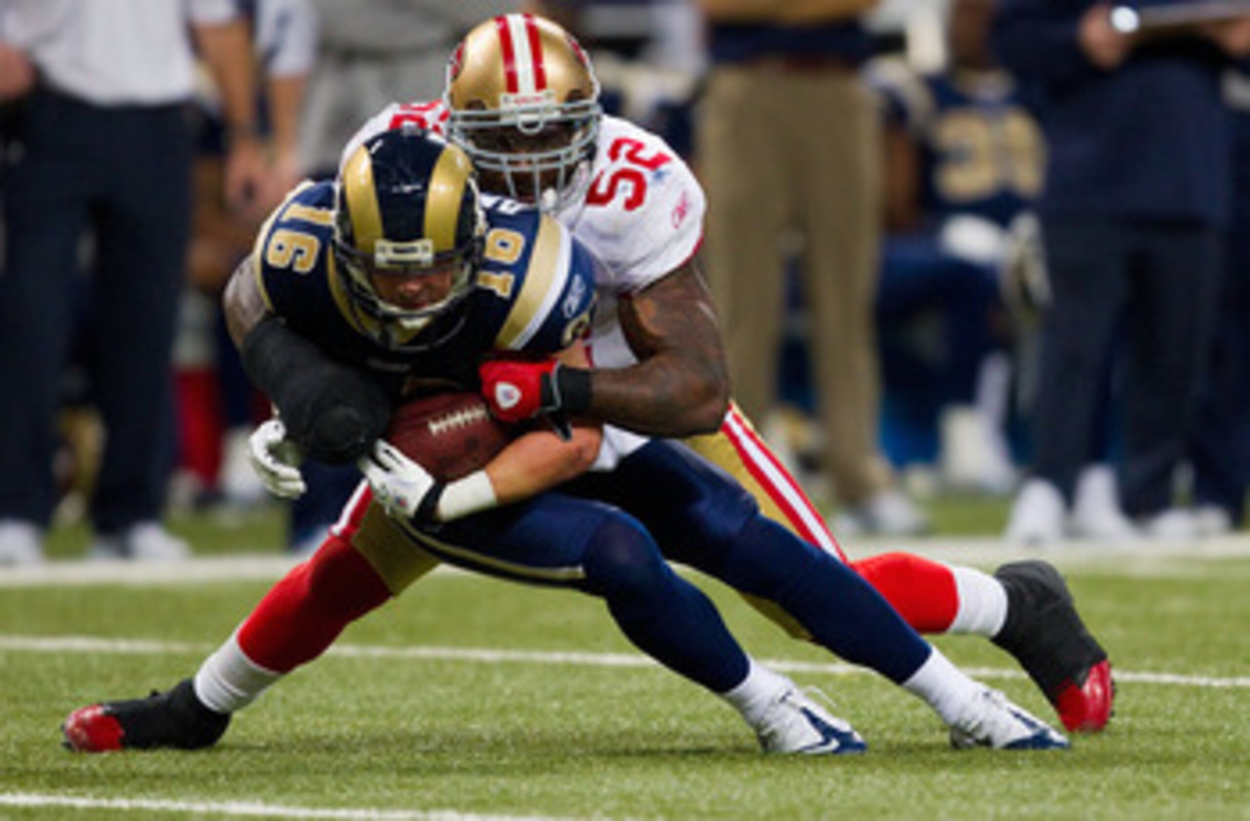 ST. LOUIS, MO - DECEMBER 26: Patrick Willis #52 of the San Francisco 49ers tackles Danny Amendola #16 of the St. Louis Rams at the Edward Jones Dome on December 26, 2010 in St. Louis, Missouri. The Rams beat the 49ers 25-17. (Photo by Dilip Vishwanat/Gett