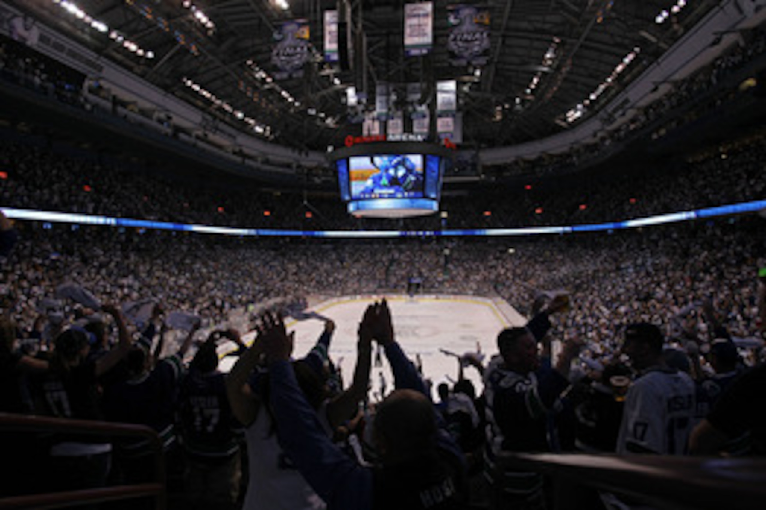 VANCOUVER, BC - JUNE 04:  Fans cheer after Alex Burrows #14 of the Vancouver Canucks scored a goal against Tim Thomas #30 of the Boston Bruins in the middle of the first period during Game Two of the 2011 NHL Stanley Cup Final at Rogers Arena on June 4, 2