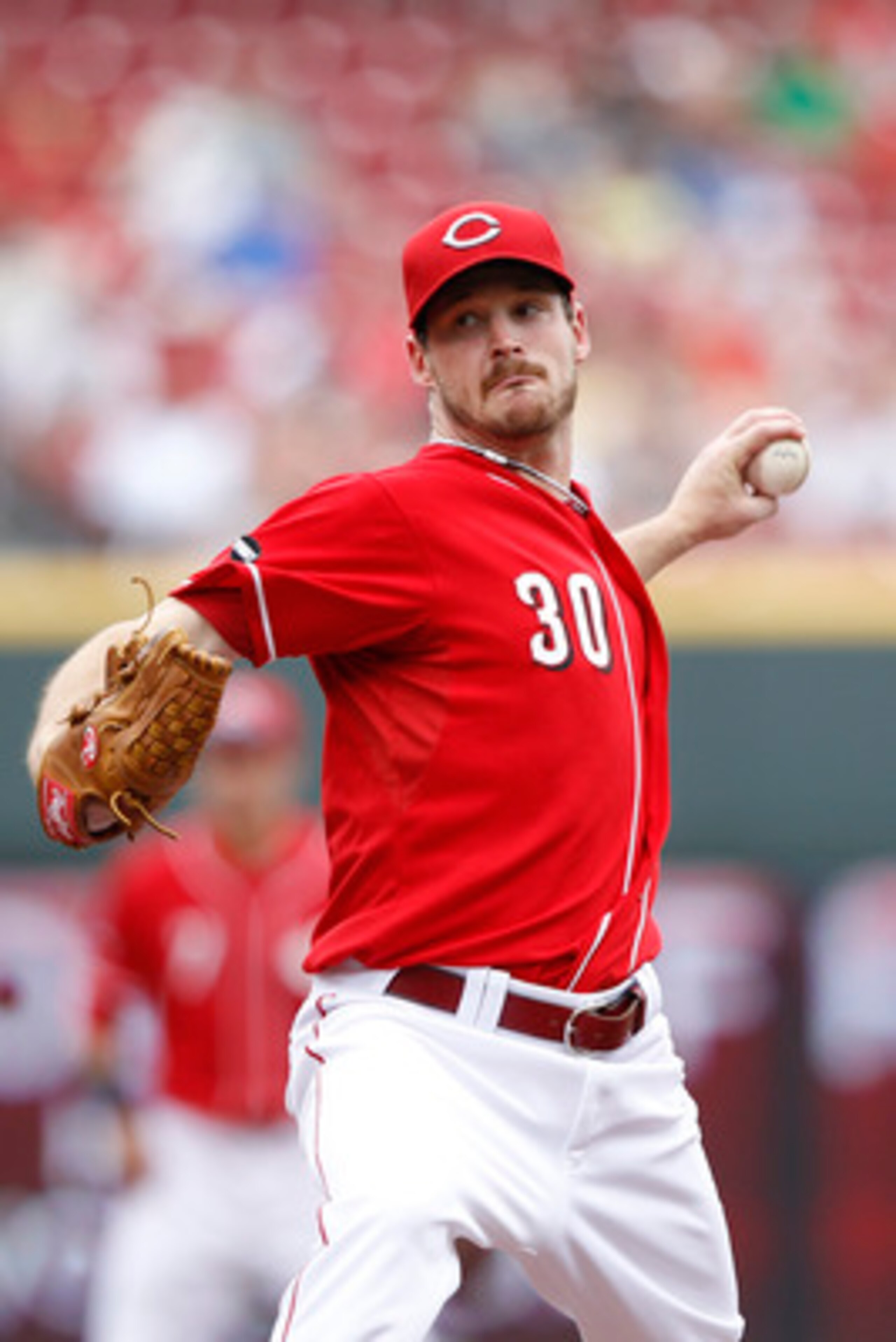 CINCINNATI, OH - JUNE 5: Travis Wood #30 of the Cincinnati Reds pitches against the Los Angeles Dodgers at Great American Ball Park on June 5, 2011 in Cincinnati, Ohio. The Dodgers defeated the Reds 9-6. (Photo by Joe Robbins/Getty Images)
