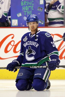 VANCOUVER, BC - JUNE 10:  Henrik Sedin #33 of the Vancouver Canucks looks on during Game Five of the 2011 NHL Stanley Cup Final at Rogers Arena on June 10, 2011 in Vancouver, British Columbia, Canada.  (Photo by Bruce Bennett/Getty Images)