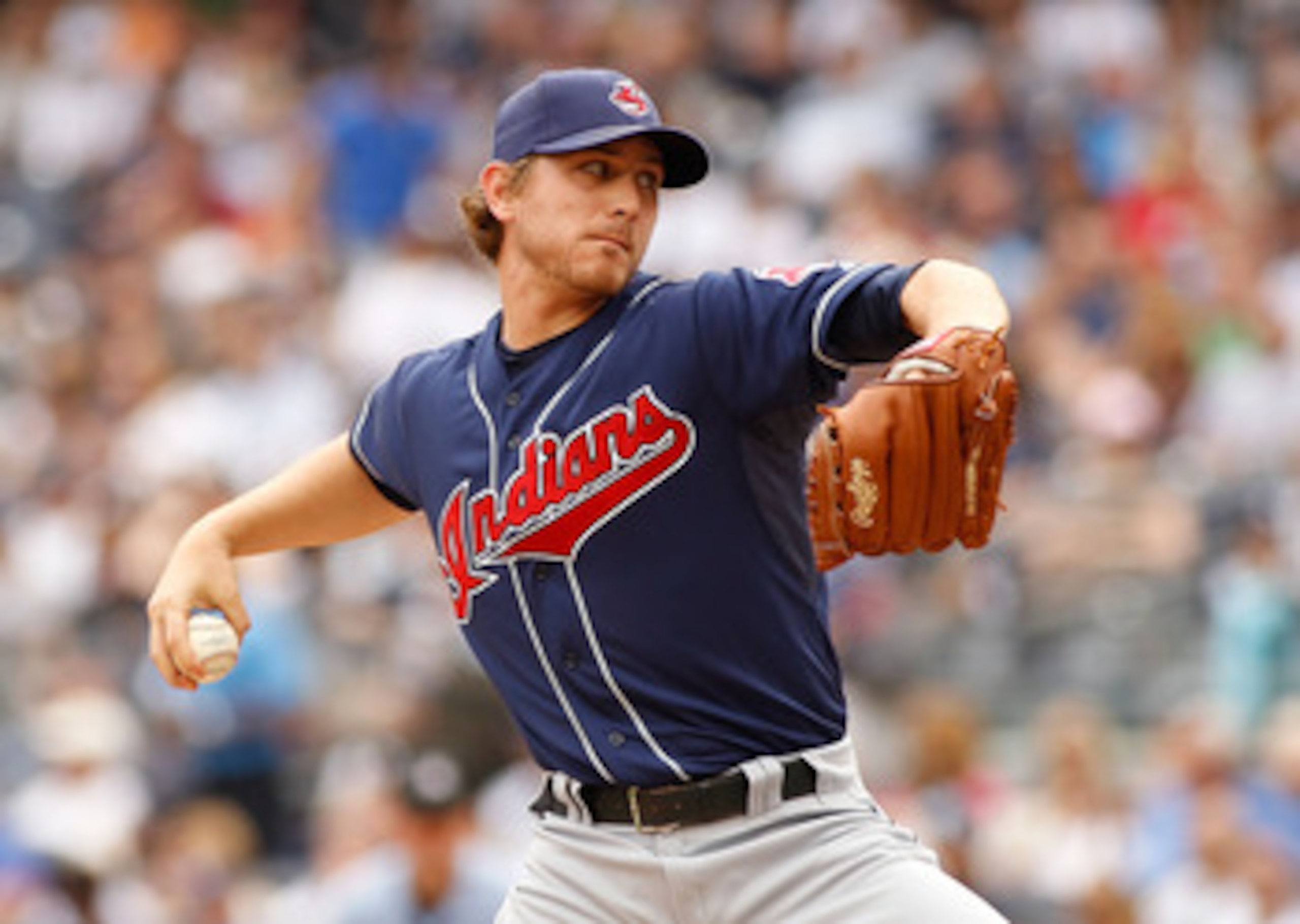 NEW YORK - JUNE 12:  Josh Tomlin #43 of the Cleveland Indians delivers a pitch in the first inning against the New York Yankees on June 12, 2011 at Yankee Stadium in the Bronx borough of New York City.  (Photo by Mike Stobe/Getty Images)