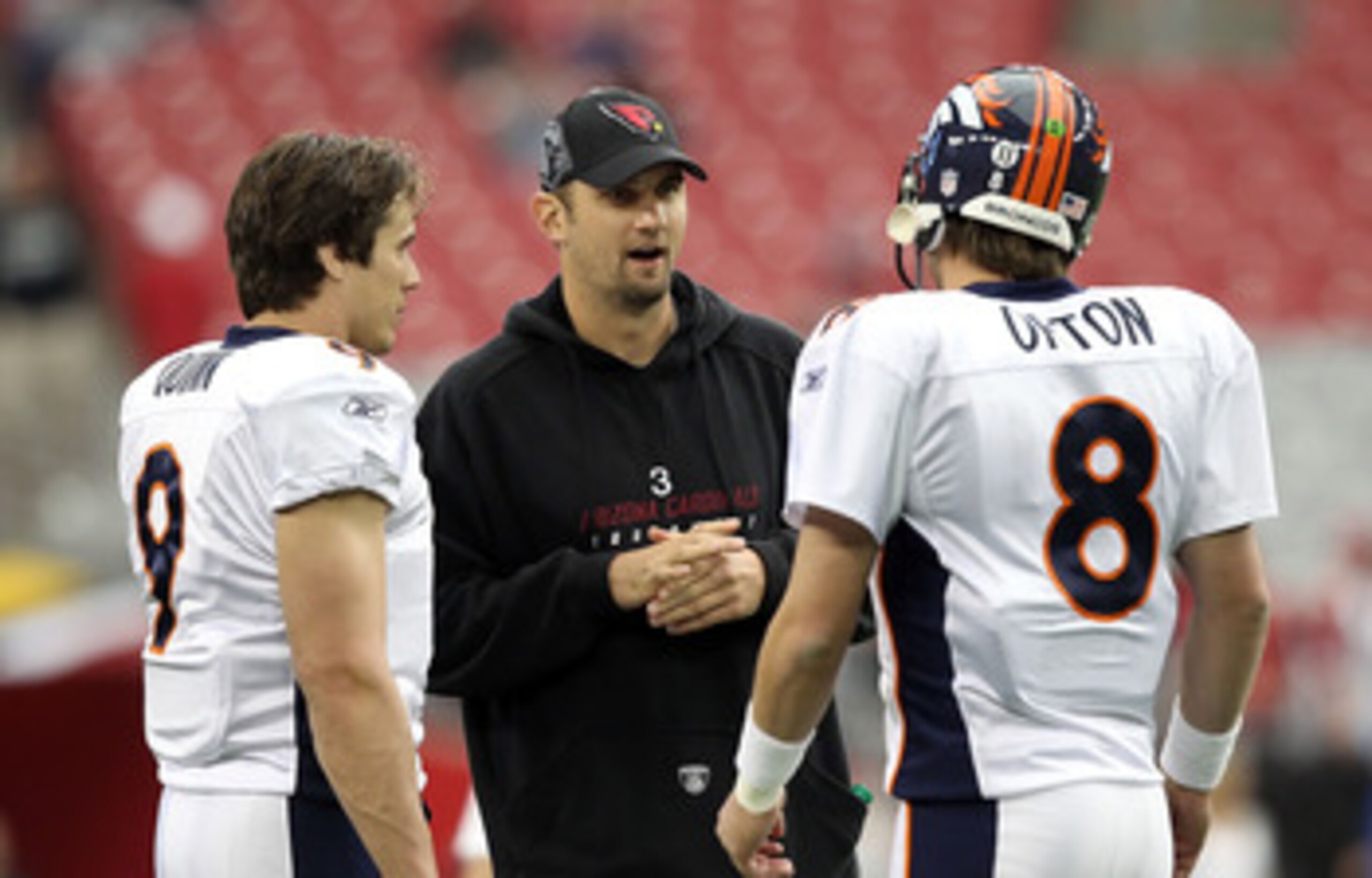 GLENDALE, AZ - DECEMBER 12:  Quarterbacks Derek Anderson #3 of the Arizona Cardinals talks with Kyle Orton #8 of the Denver Broncos before the NFL game at the University of Phoenix Stadium on December 12, 2010 in Glendale, Arizona. The Cardinals defeated 