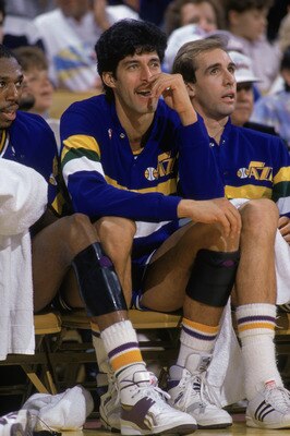 SALT LAKE CITY - 1989:  Jose Ortiz #44 of the Utah Jazz sits on the bench during an NBA game at The Salt Palace in Salt Lake City, Utah in 1989. (Photo by Rick Stewart/Getty Images)