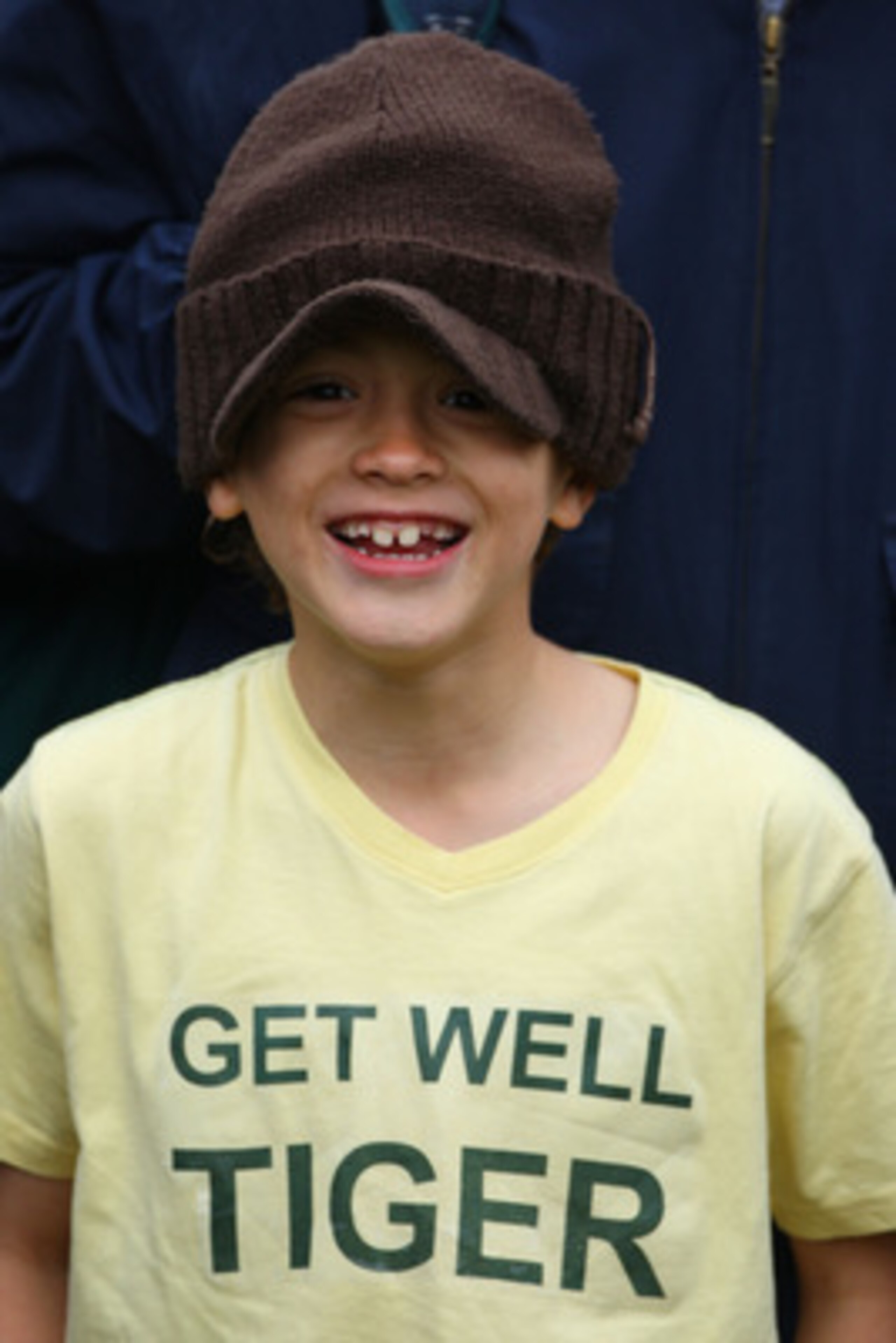 SOUTHPORT, UNITED KINGDOM - JULY 18: A young spectator wears a t-shirt wishing Tiger Woods well during the second round of the 137th Open Championship on July 18, 2008 at Royal Birkdale Golf Club, Southport, England. (Photo by Stuart Franklin/Getty Imag SOUTHPORT, UNITED KINGDOM - JULY 18: A young spectator wears a t-shirt wishing Tiger Woods well during the second round of the 137th Open Championship on July 18, 2008 at Royal Birkdale Golf Club, Southport, England. (Photo by Stuart Franklin/Getty Imag