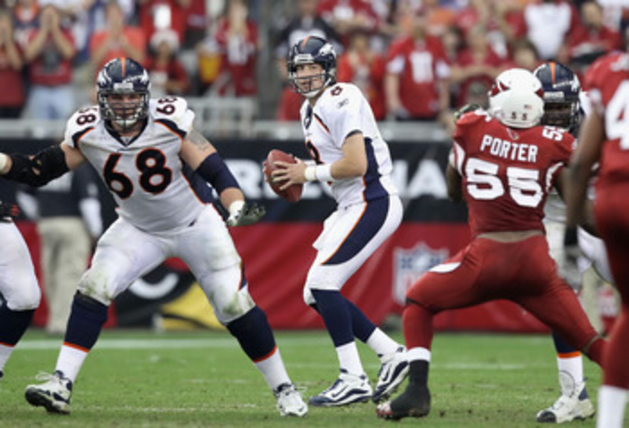 GLENDALE, AZ - DECEMBER 12:  Quarterback Kyle Orton #8 of the Denver Broncos drops back to pass during the NFL game against the Arizona Cardinals at the University of Phoenix Stadium on December 12, 2010 in Glendale, Arizona.  The Cardinals defeated the B