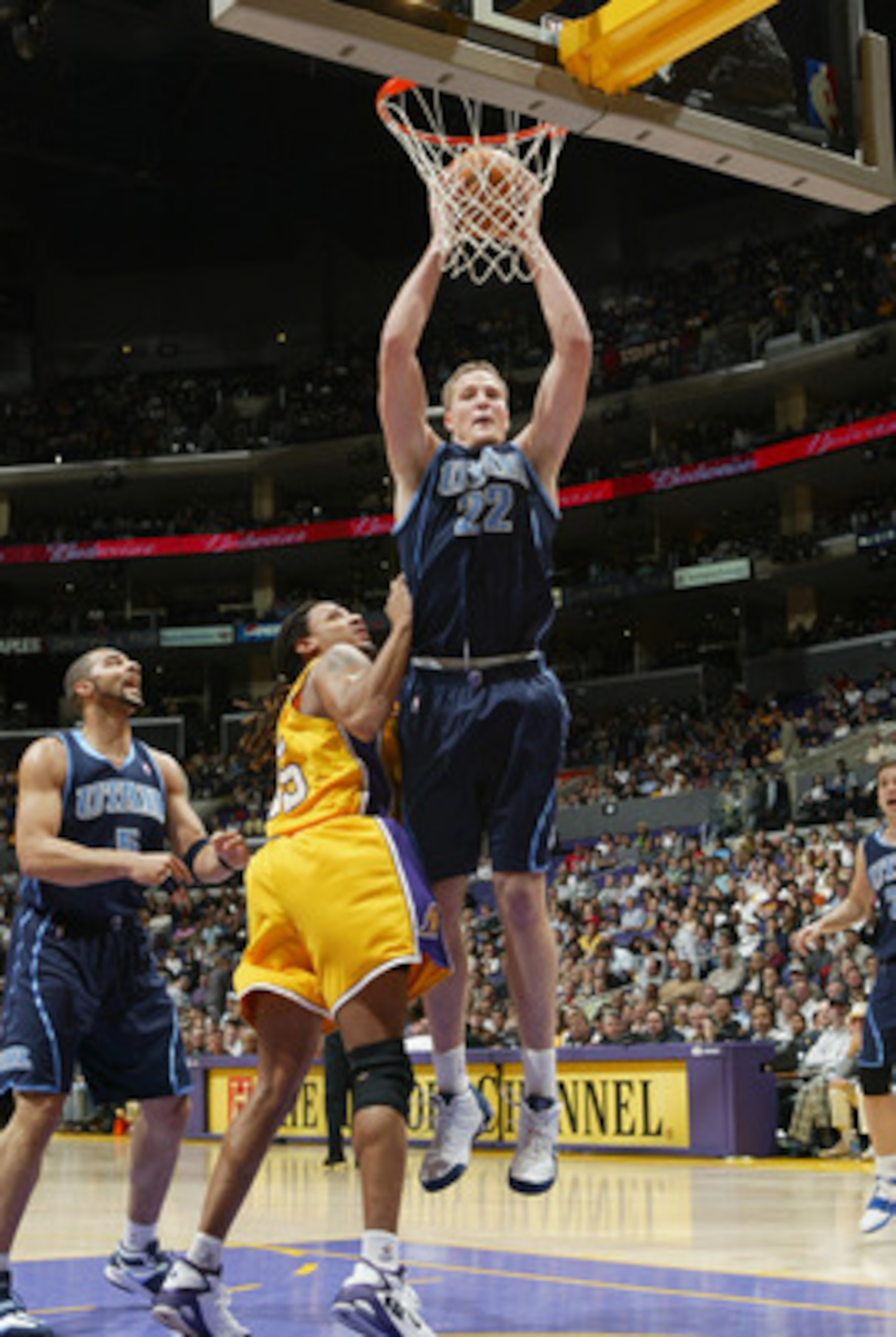 LOS ANGELES - JANUARY 17:  Curtis Borchardt #22 of the Utah Jazz rebounds near Brian Grant #55 of the Los Angeles Lakers during the game on January 17, 2005 at Staples Center in Los Angeles, California. The Jazz won 102-94. NOTE TO USER: User expressly ac