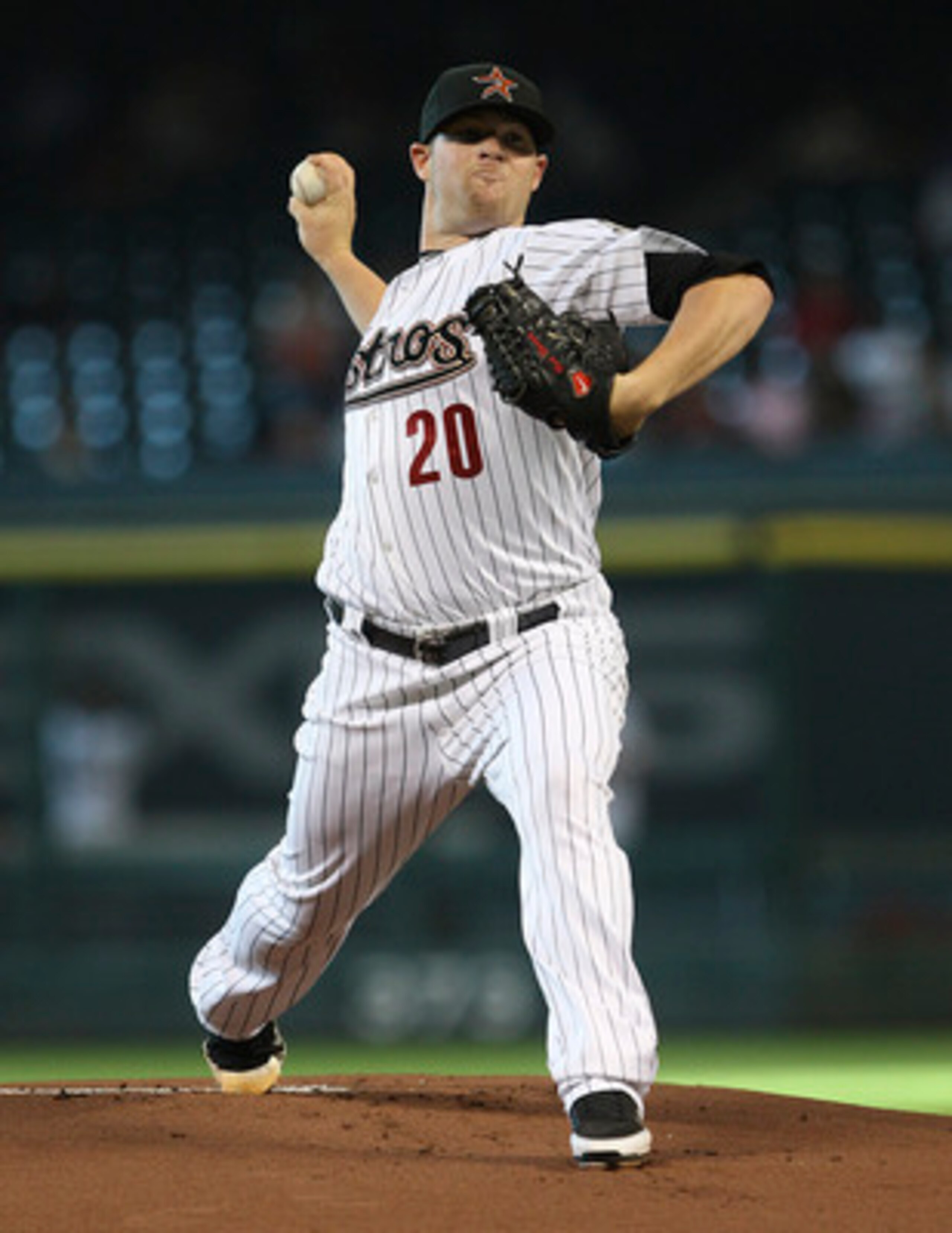 HOUSTON - JUNE 14:  Pitcher Bud Norris #20 of the Houston Astros throws against the Pittsburgh Pirates at Minute Maid Park on June 14, 2011 in Houston, Texas.  (Photo by Bob Levey/Getty Images)