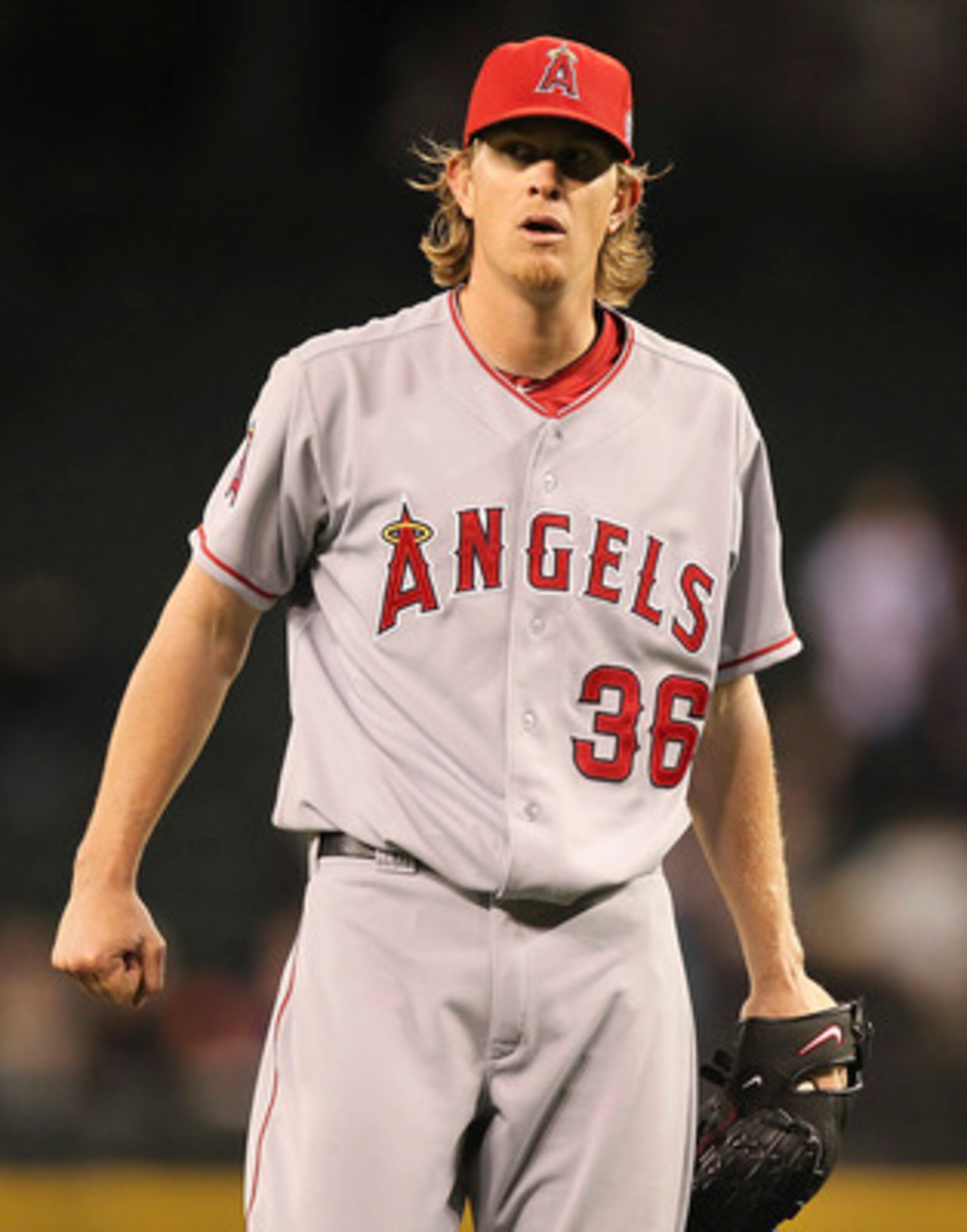 SEATTLE - JUNE 14:  Starting pitcher Jered Weaver #36 of the Los Angeles Angels of Anaheim reacts as the final out is made in a complete game 4-0 shutout against the Seattle Mariners at Safeco Field on June 14, 2011 in Seattle, Washington. (Photo by Otto 