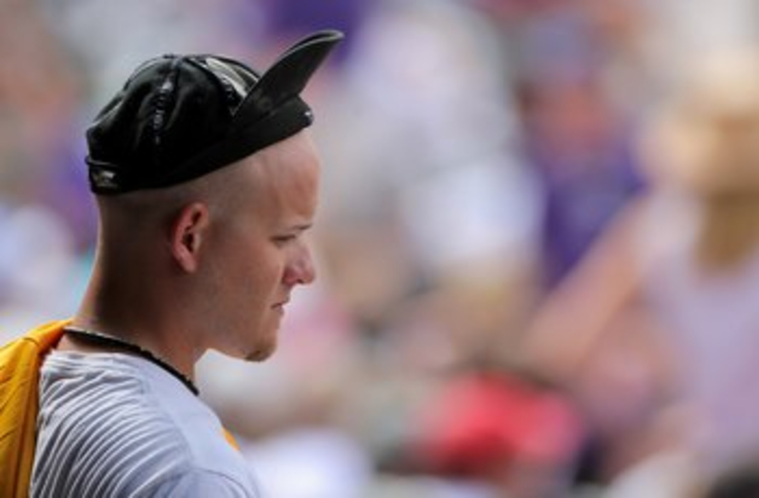 DENVER - JULY 12: A fan of the Colorado Rockies sports his rally cap as the Rockies came from behind against the Atlanta Braves during MLB action at Coors Field on July 12, 2009 in Denver, Colorado. The Rockies defeated the Braves 8-7. (Photo by Doug Pe DENVER - JULY 12: A fan of the Colorado Rockies sports his rally cap as the Rockies came from behind against the Atlanta Braves during MLB action at Coors Field on July 12, 2009 in Denver, Colorado. The Rockies defeated the Braves 8-7. (Photo by Doug Pe