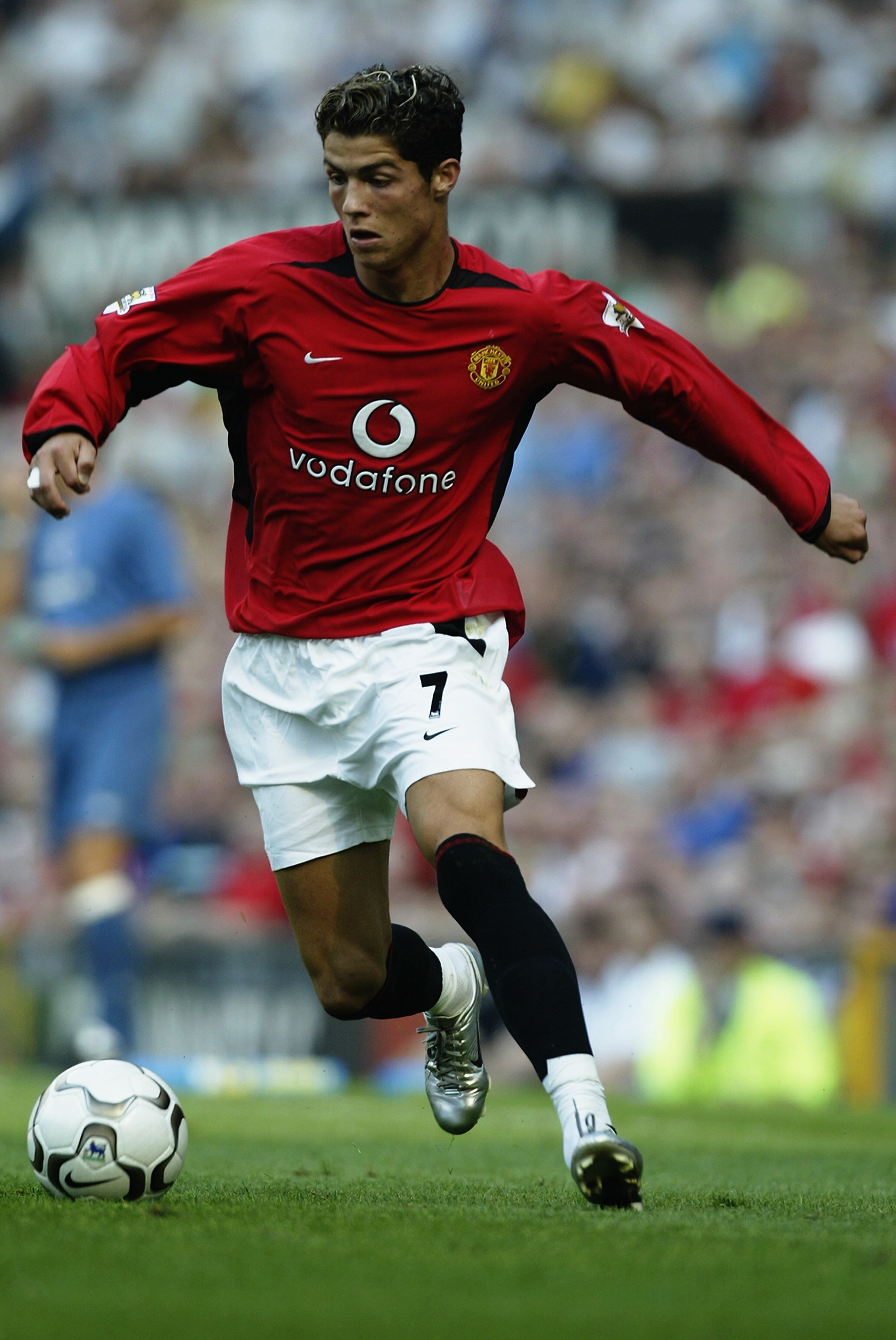 MANCHESTER - AUGUST 16:  Cristiano Ronaldo of Manchester United makes his debut for his new club during the FA Barclaycard Premiership match between Manchester United and Bolton Wanderers held on August 16, 2003 at Old Trafford, in Manchester, England. Ma