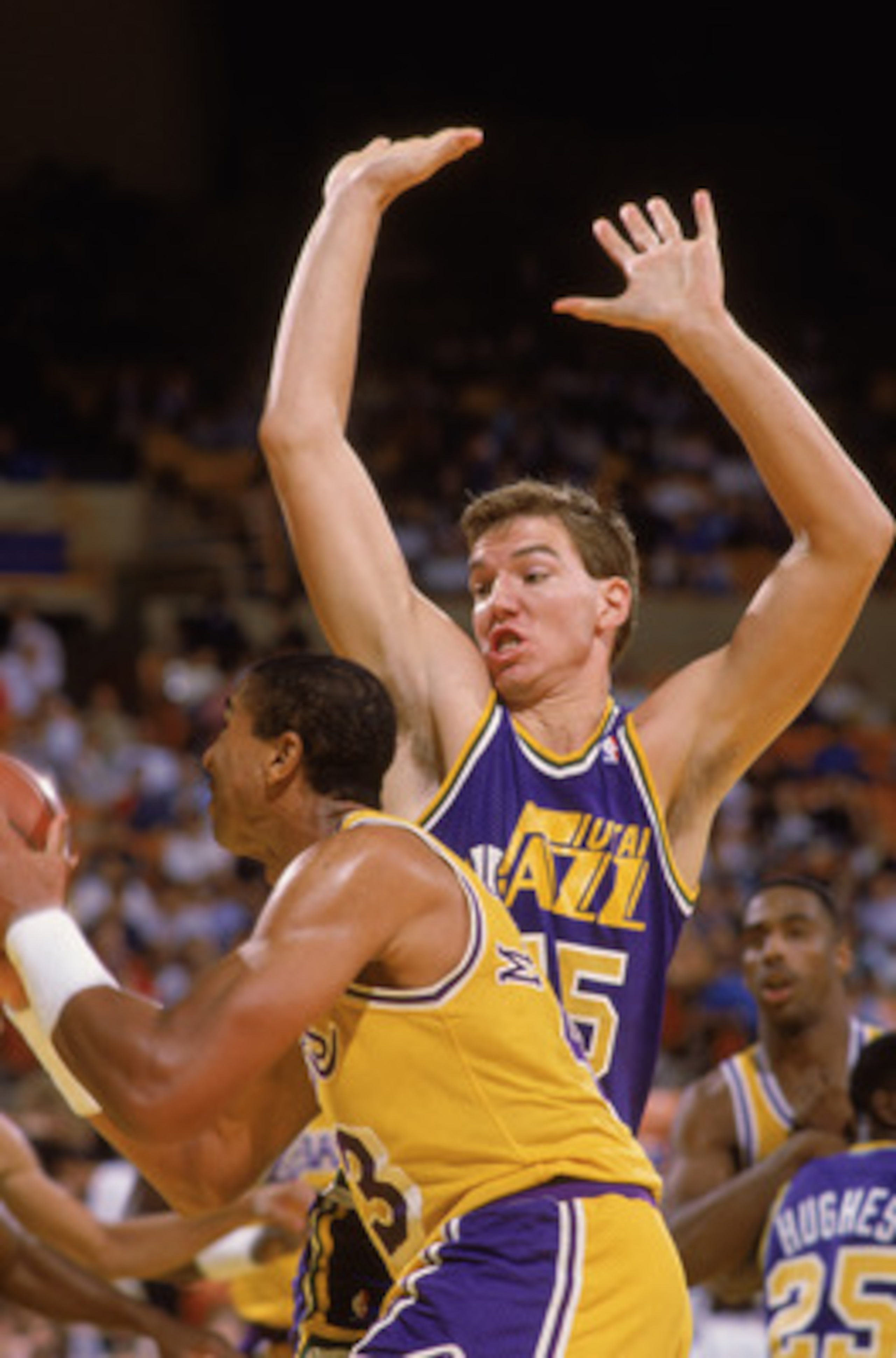 SALT LAKE CITY - 1989:  Eric Leckner #55 of the Utah Jazz plays defense during an NBA game at The Salt Palace in Salt Lake City, Utah in 1989. (Photo by Mike Powell/Getty Images)