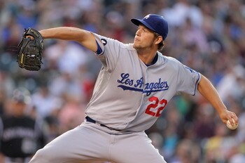 DENVER, CO - JUNE 09:  Starting pitcher Clayton Kershaw #22 of the Los Angeles Dodgers delivers against the Colorado Rockies at Coors Field on June 9, 2011 in Denver, Colorado.  (Photo by Doug Pensinger/Getty Images)