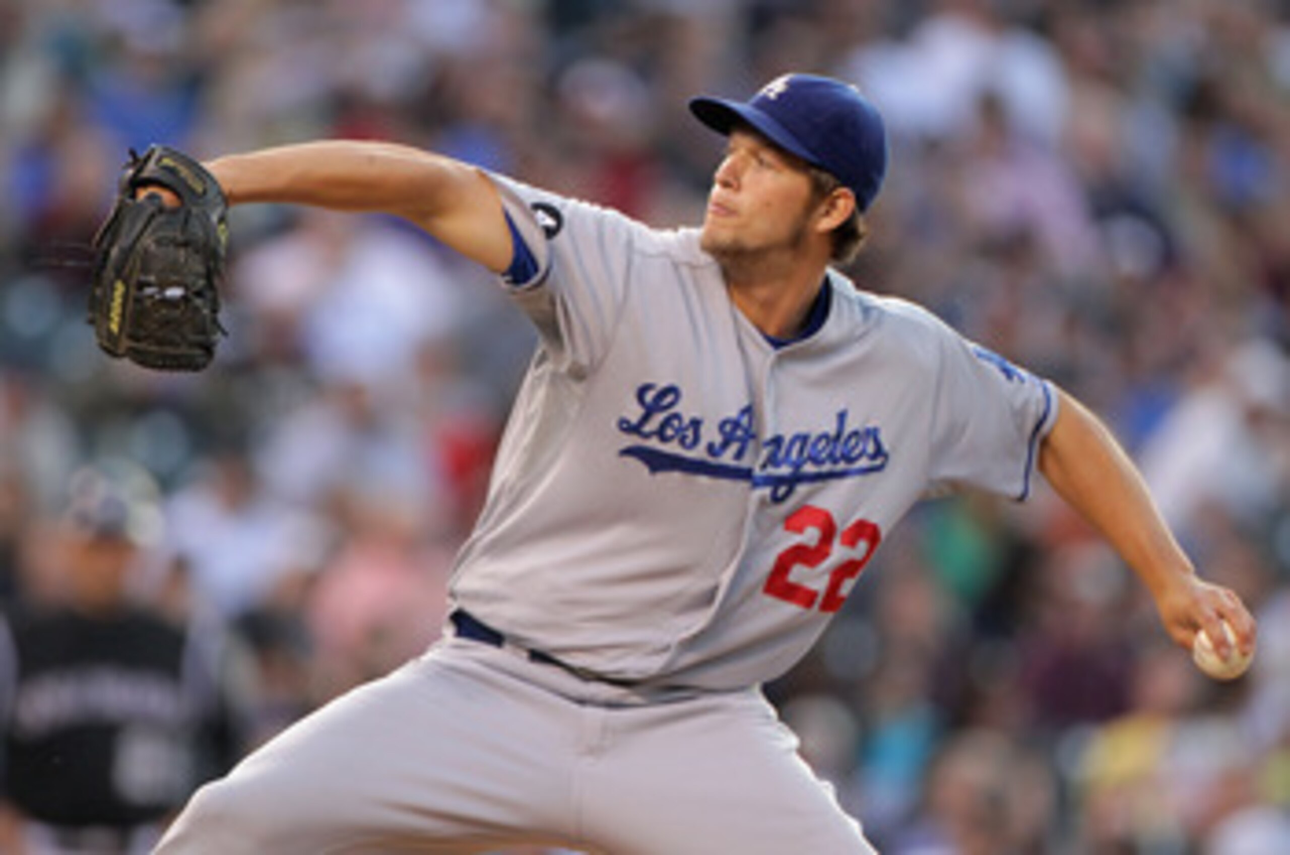 DENVER, CO - JUNE 09:  Starting pitcher Clayton Kershaw #22 of the Los Angeles Dodgers delivers against the Colorado Rockies at Coors Field on June 9, 2011 in Denver, Colorado.  (Photo by Doug Pensinger/Getty Images)