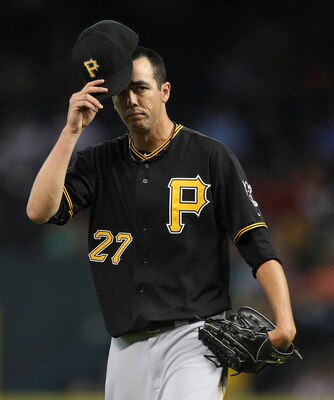 HOUSTON - JUNE 14:  PItcher Jeff Karstens #27 of the Pittsburgh Pirates reacts after being called for a balk in the fifth inning against the Houston Astros at Minute Maid Park on June 14, 2011 in Houston, Texas.  (Photo by Bob Levey/Getty Images)