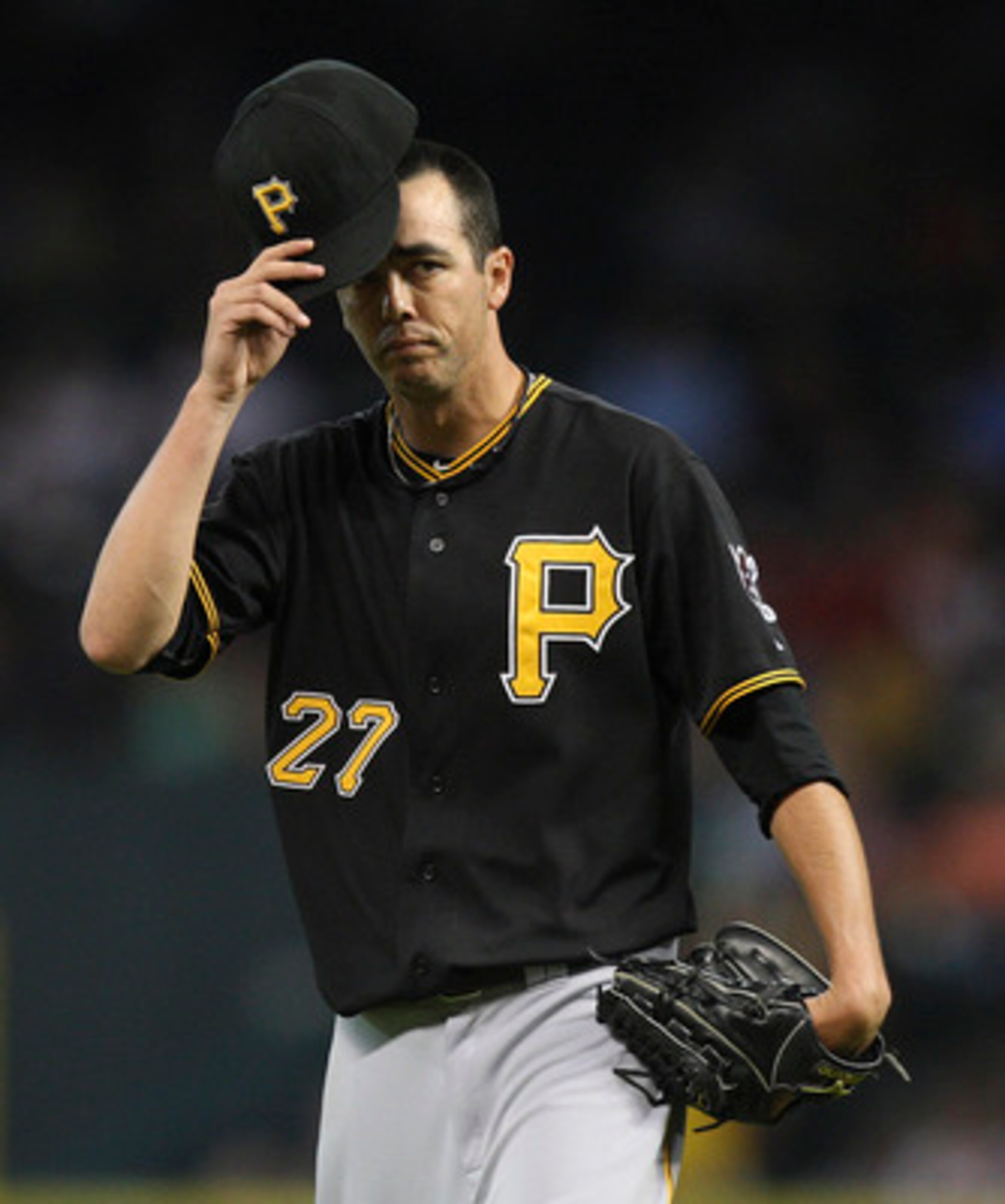 HOUSTON - JUNE 14:  PItcher Jeff Karstens #27 of the Pittsburgh Pirates reacts after being called for a balk in the fifth inning against the Houston Astros at Minute Maid Park on June 14, 2011 in Houston, Texas.  (Photo by Bob Levey/Getty Images)