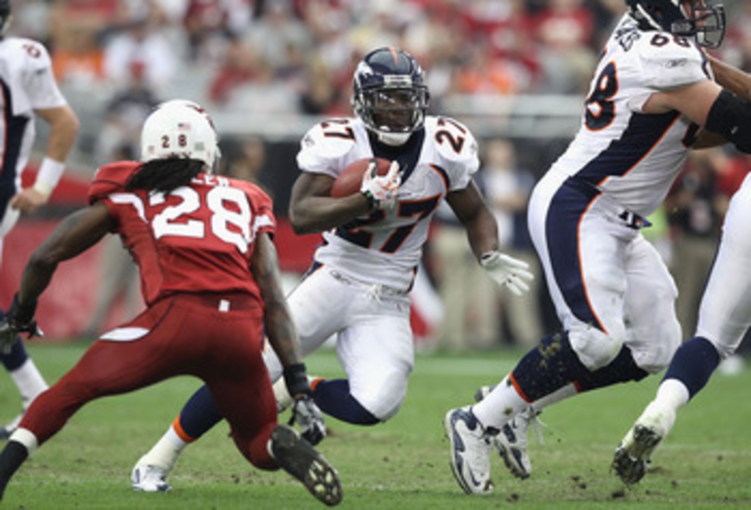GLENDALE, AZ - DECEMBER 12:  Runningback Knowshon Moreno #27 of the Denver Broncos runs with the football during the NFL game against the Arizona Cardinals at the University of Phoenix Stadium on December 12, 2010 in Glendale, Arizona.  The Cardinals defe