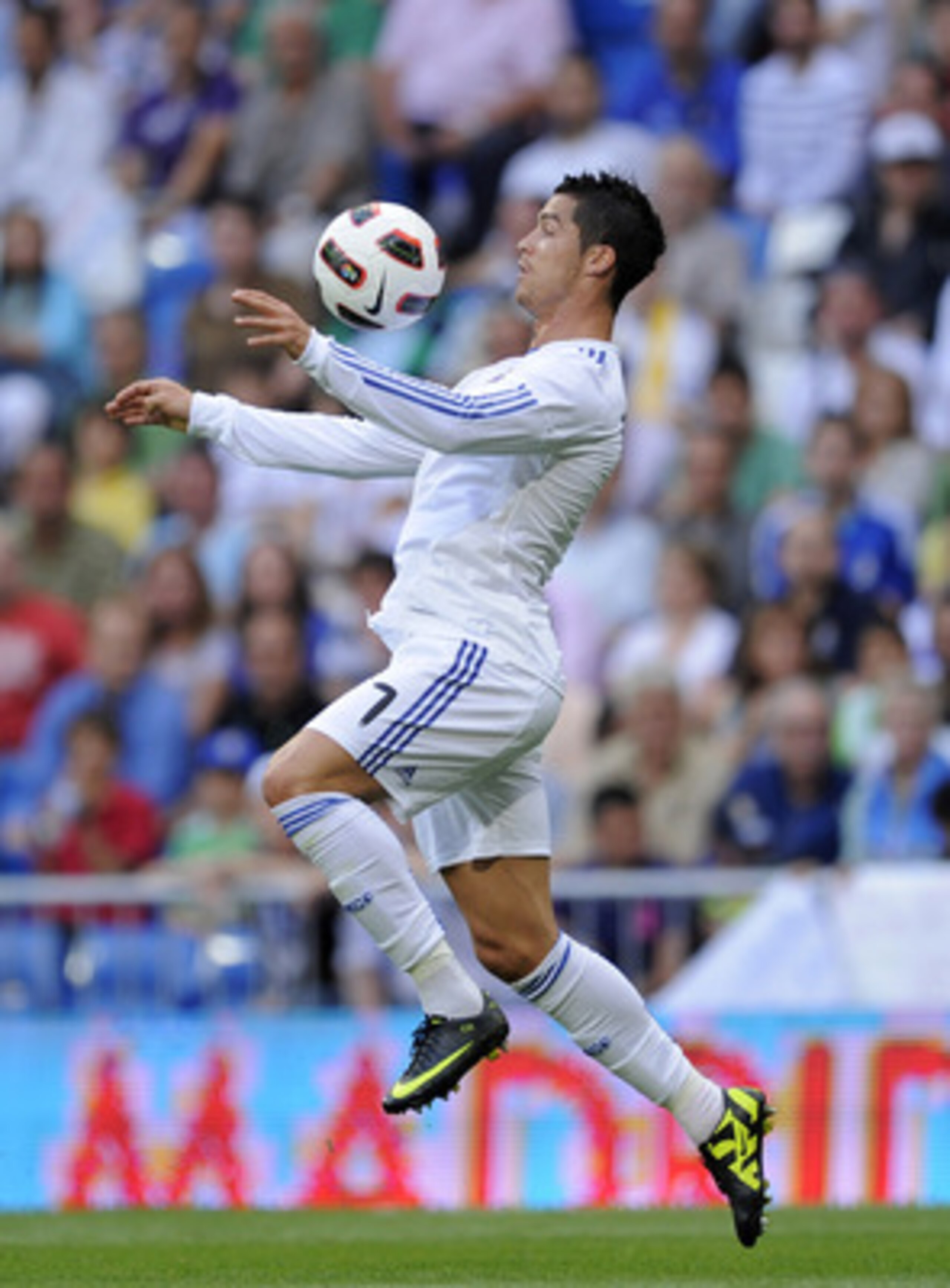 MADRID, SPAIN - MAY 21: Cristiano Ronaldo of Real Madrid controls the ball during the La Liga match between Real Madrid and UD Almeria at Estadio Santiago Bernabeu on May 21, 2011 in Madrid, Spain.  (Photo by Denis Doyle/Getty Images)