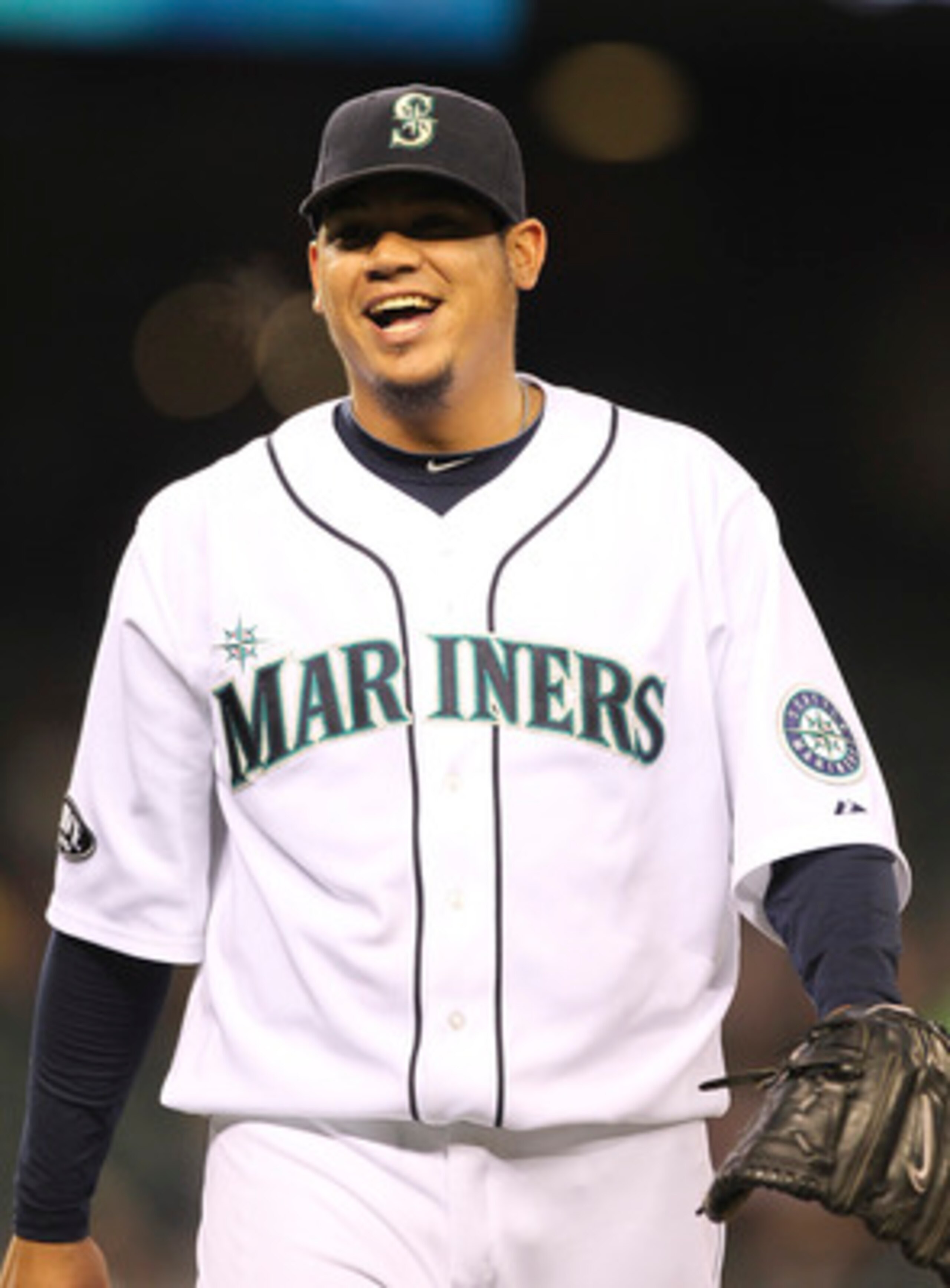 SEATTLE - JUNE 02:  Starting pitcher Felix Hernandez #34 of the Seattle Mariners smiles as he leaves the field in the seventh inning  against the Tampa Bay Rays at Safeco Field on June 2, 2011 in Seattle, Washington. (Photo by Otto Greule Jr/Getty Images)