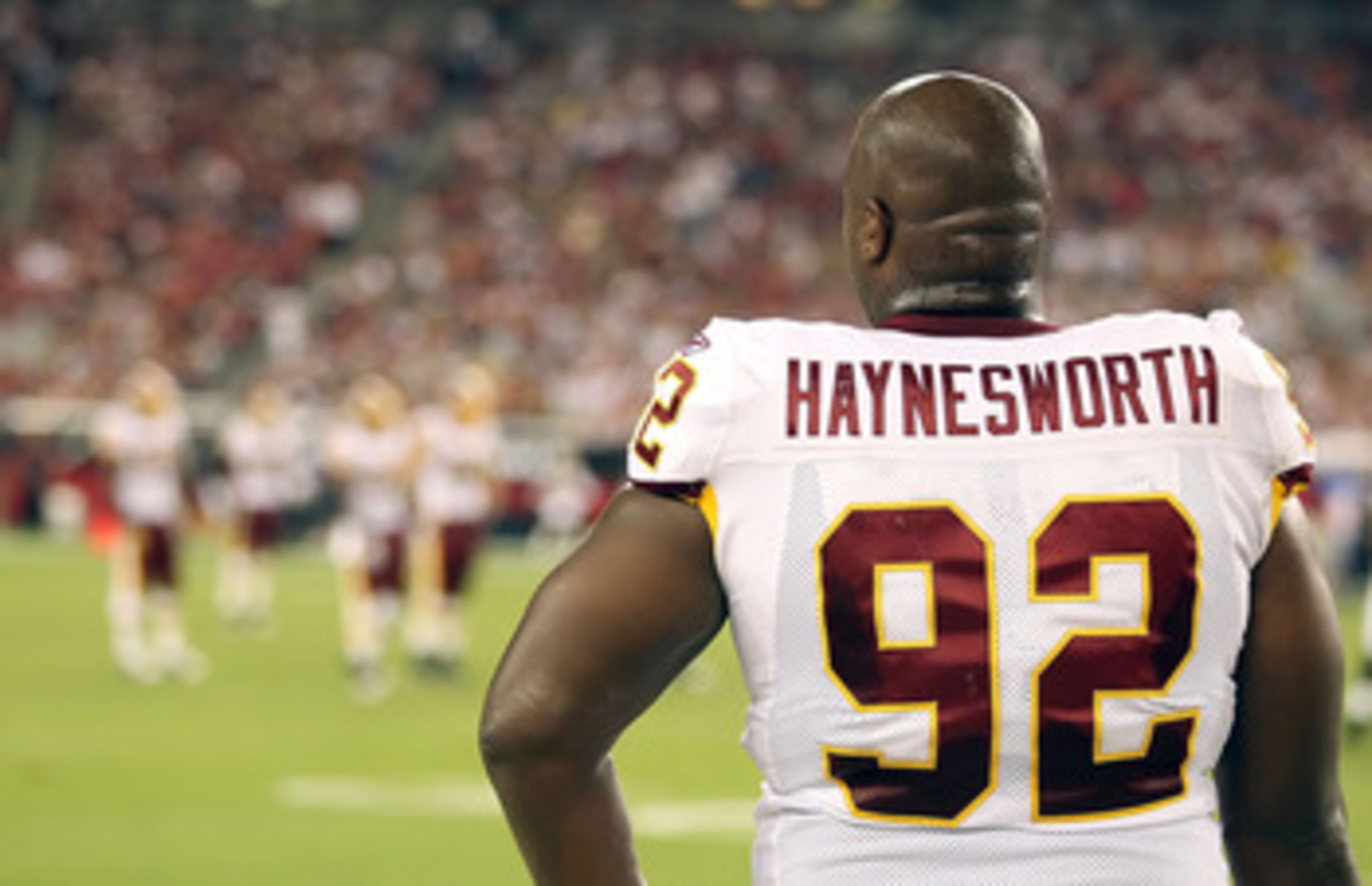 GLENDALE, AZ - SEPTEMBER 02:  Defensive tackle Albert Haynesworth #92 of the Washington Redskins stands on the sidelines during preseason NFL game against the Arizona Cardinals at the University of Phoenix Stadium on September 2, 2010 in Glendale, Arizona