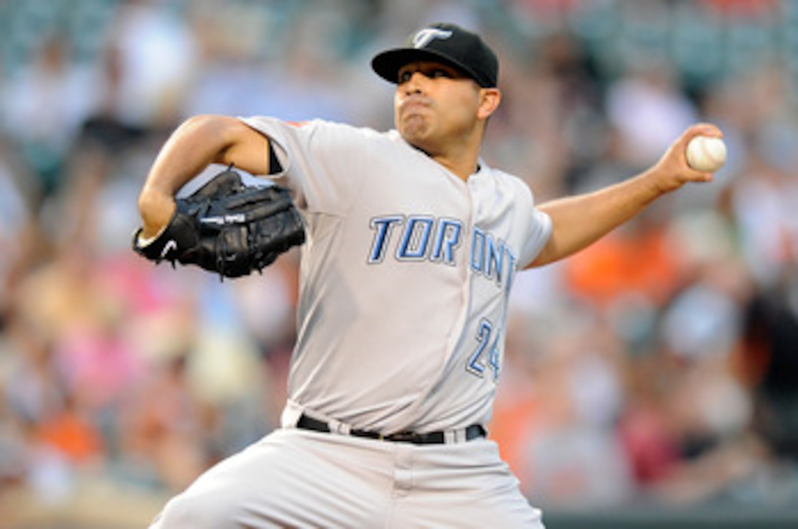 BALTIMORE - JULY 16:  Ricky Romero #24 of the Toronto Blue Jays pitches against the Baltimore Orioles at Camden Yards on July 16, 2010 in Baltimore, Maryland.  (Photo by Greg Fiume/Getty Images)