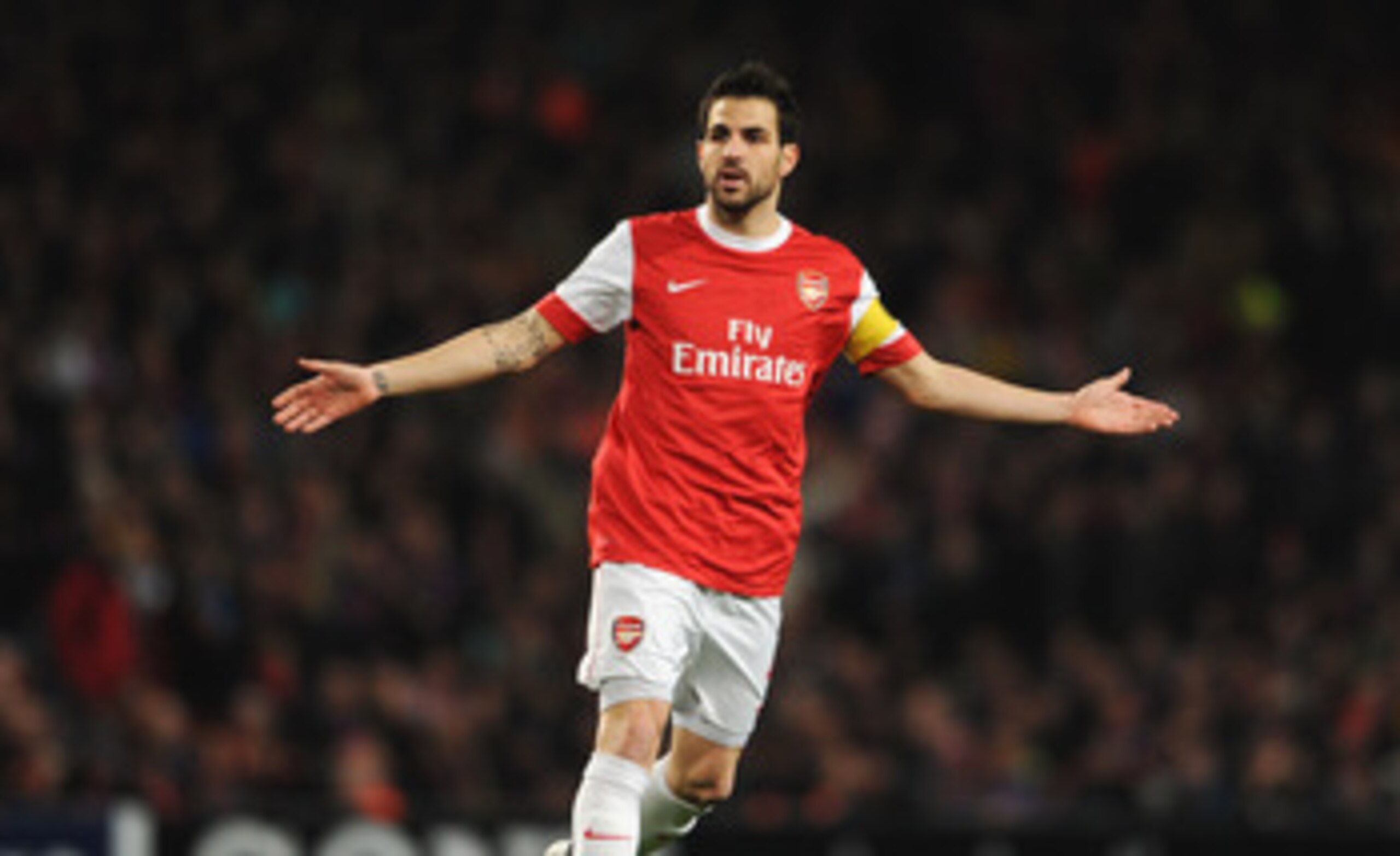 LONDON, ENGLAND - FEBRUARY 16:  Cesc Fabregas of Arsenal shows his frustration during the UEFA Champions League round of 16 first leg match between Arsenal and Barcelona at the Emirates Stadium on February 16, 2011 in London, England.  (Photo by Jasper Ju