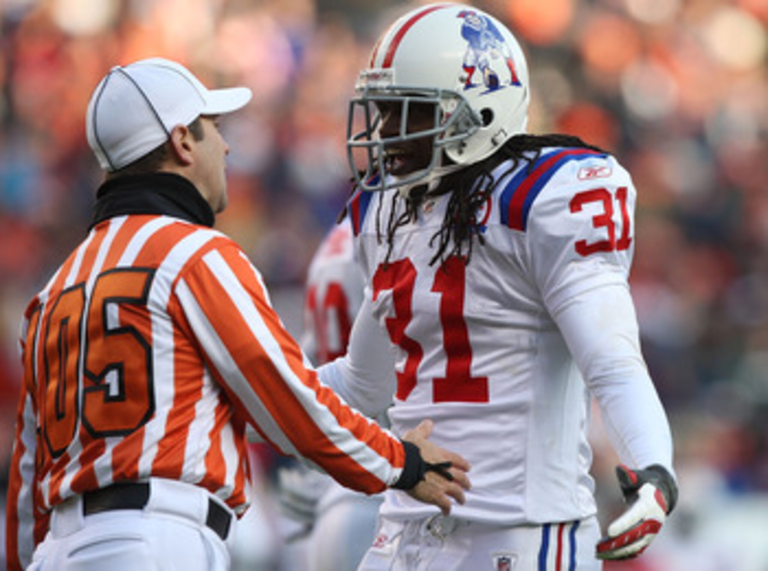DENVER - OCTOBER 11: Brandon Meriweather #31 of the New England Patriots is called for a personal foul in the fourth quarter against the Denver Broncos during an NFL game at Invesco Field at Mile High on October 11, 2009 in Denver, Colorado.  (Photo by Je