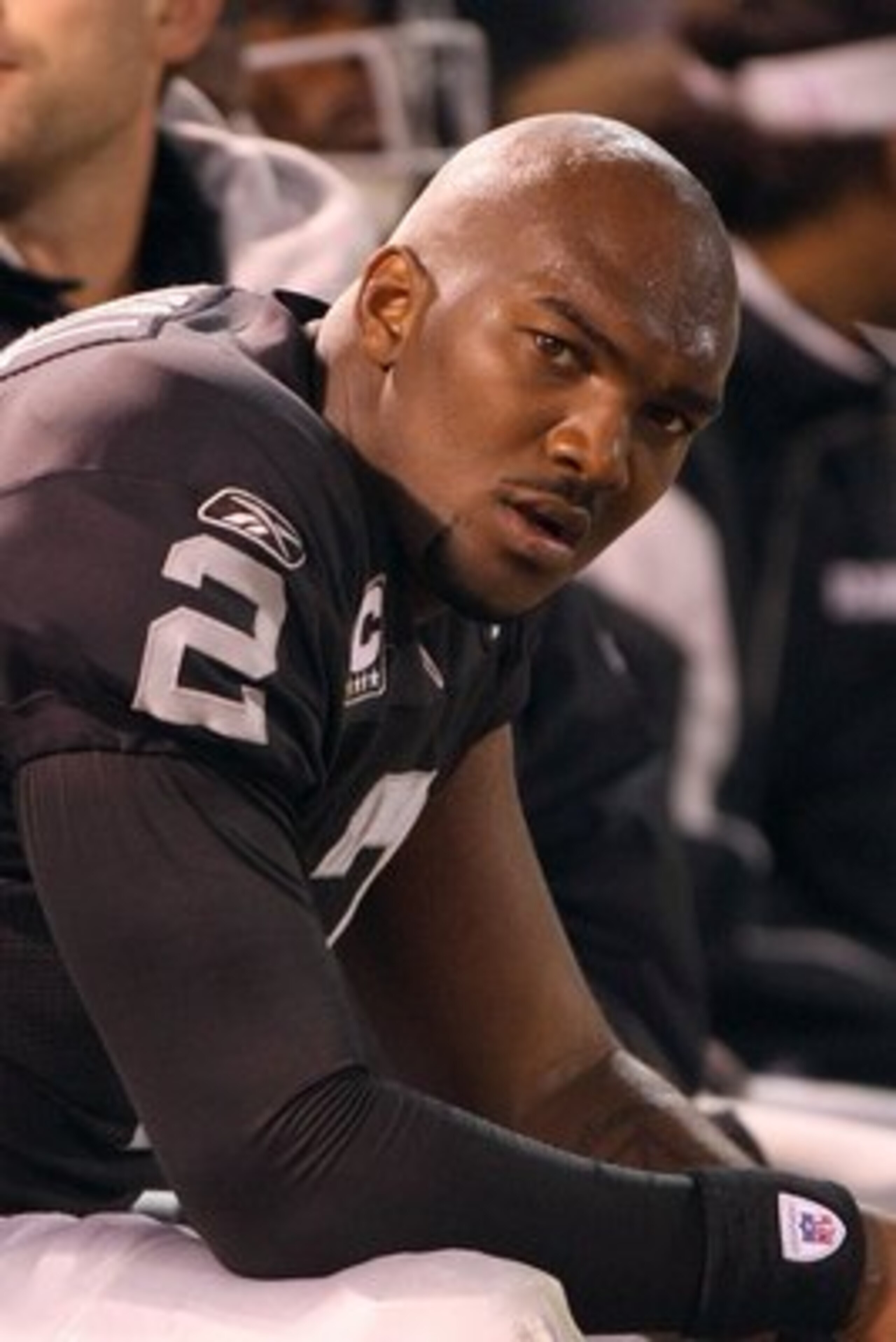 OAKLAND, CA - SEPTEMBER 8: Quarterback JaMarcus Russell #2 of the Oakland Raiders looks on from the bench during the NFL game against the Denver Broncos on September 8, 2008 at McAfee Coliseum in Oakland, California. The Broncos defeated the Raiders 41-1 OAKLAND, CA - SEPTEMBER 8: Quarterback JaMarcus Russell #2 of the Oakland Raiders looks on from the bench during the NFL game against the Denver Broncos on September 8, 2008 at McAfee Coliseum in Oakland, California. The Broncos defeated the Raiders 41-1