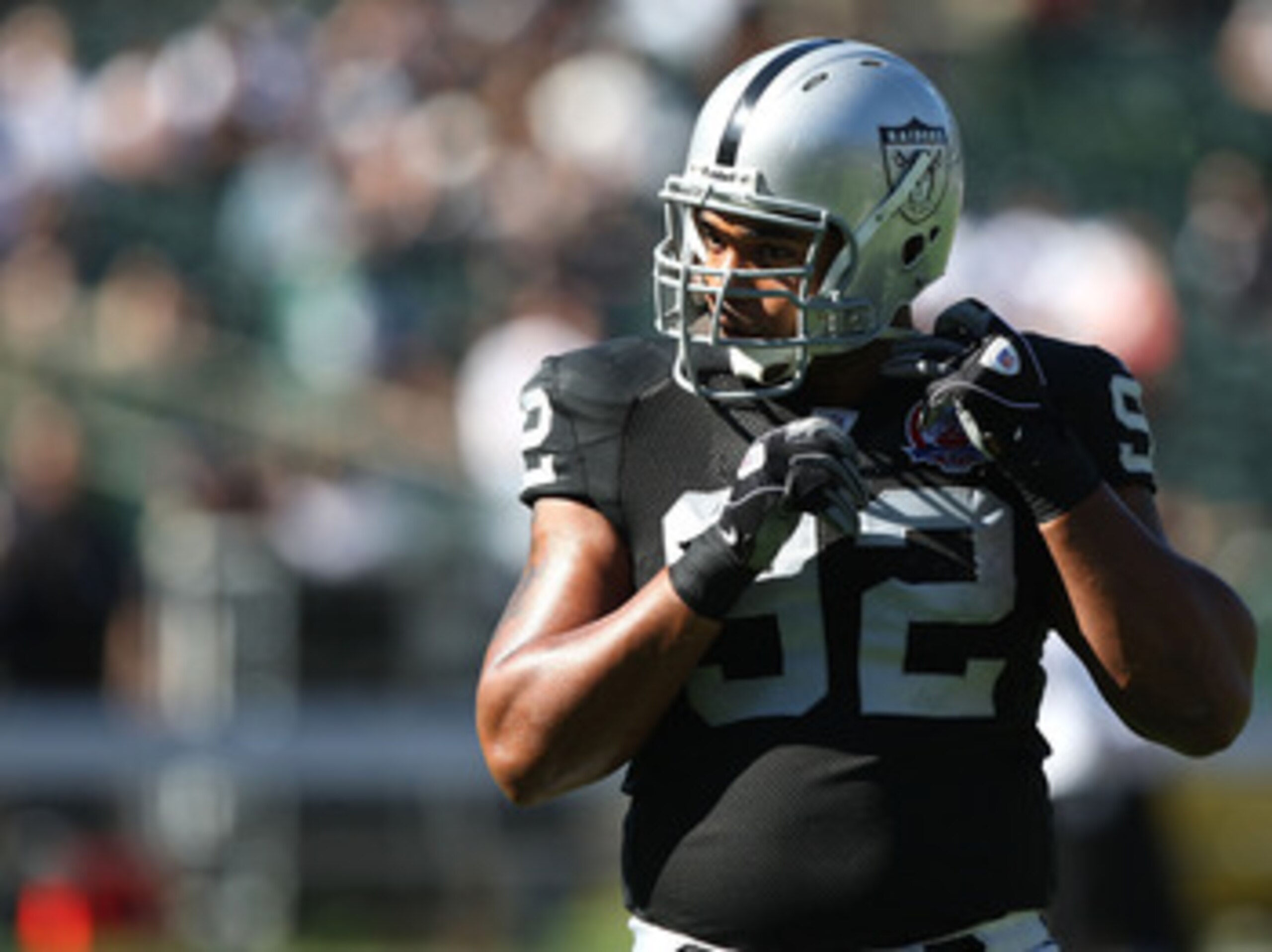OAKLAND, CA - OCTOBER 25: Richard Seymour #92 of the Oakland Raiders looks on against the New York Jets during an NFL game at the Oakland-Alameda County Coliseum on October 25, 2009 in Oakland, California. (Photo by Jed Jacobsohn/Getty Images)