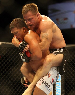 CHICAGO- OCTOBER 25: Tyson Griffin (L) fights Sean Sherk in a Lightweight bout at UFC's Ultimate Fight Night at Allstate Arena on October 25, 2008 in Chicago, Illinois. (Photo by Tasos Katopodis/Getty Images)
